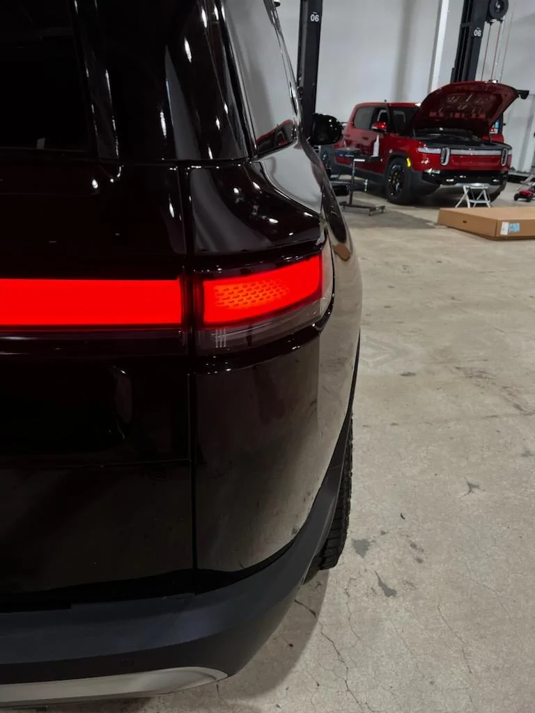 Rivian R1T R1S Hit by an EDV while sitting at the service center IMG_2169