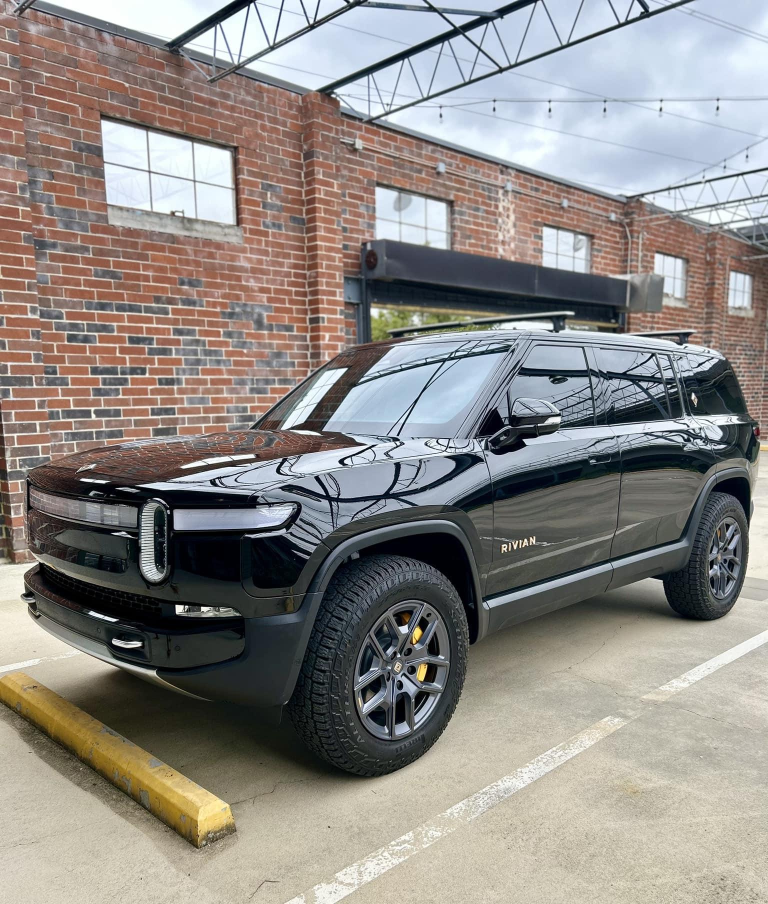 Rivian R1T R1S Hit by an EDV while sitting at the service center 391655623_10109089945857761_7570734798689754898_n_sm