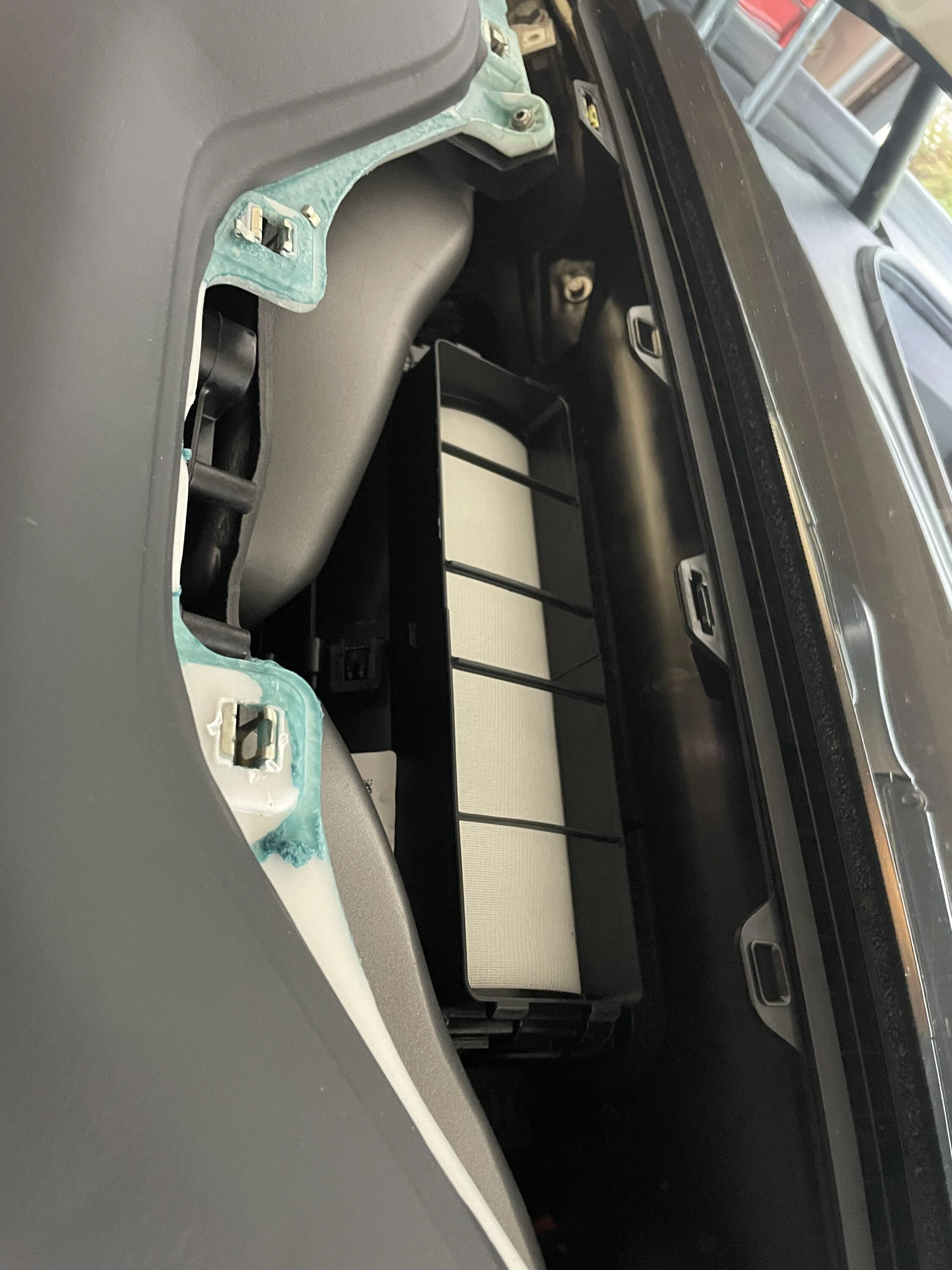Rivian R1T R1S Mobile tech fixed dash speaker grill rattle -- details & photos IMG_2206