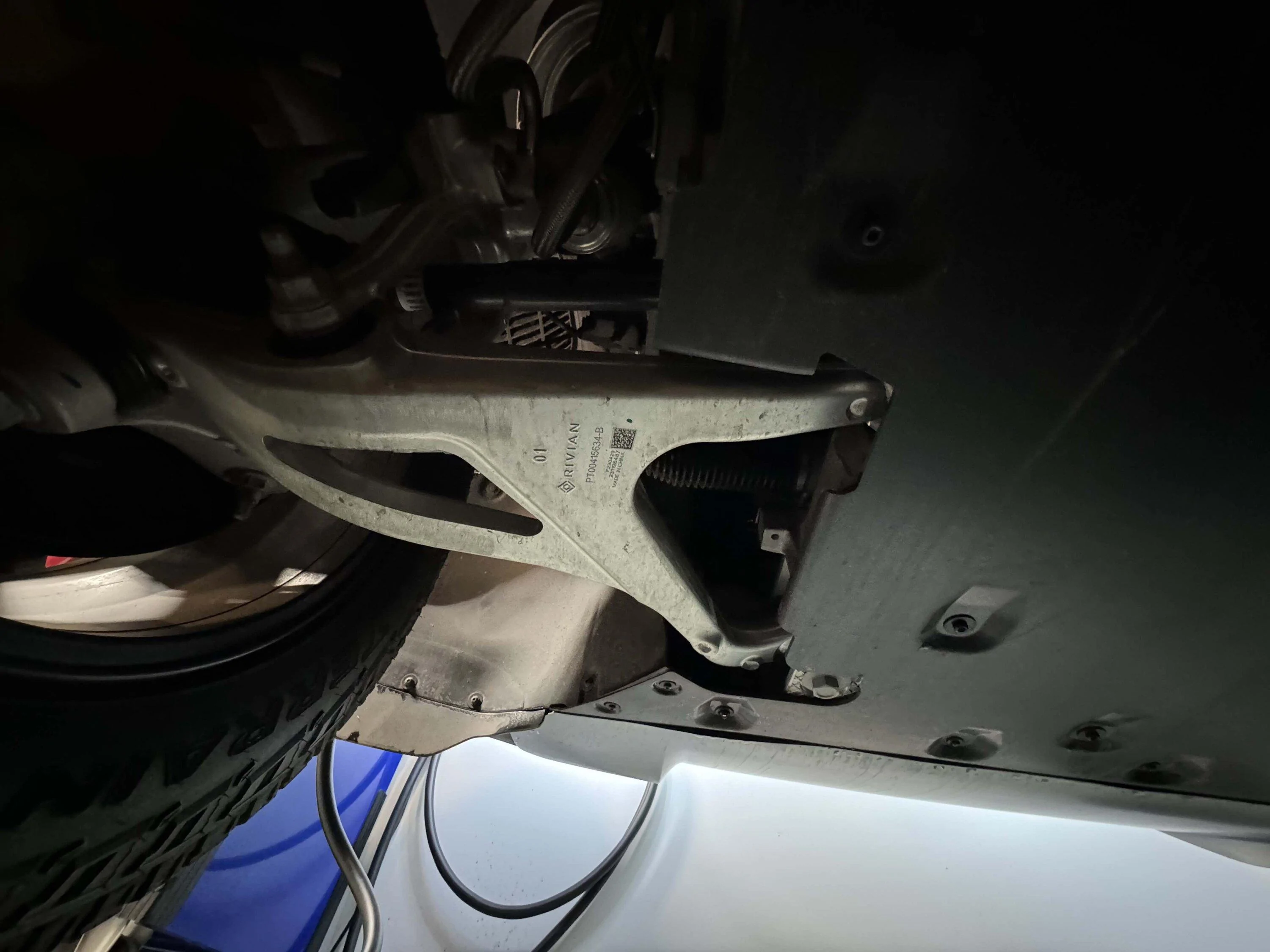 Rivian R1T R1S DIY Tire rotation on the R1S IMG_1388