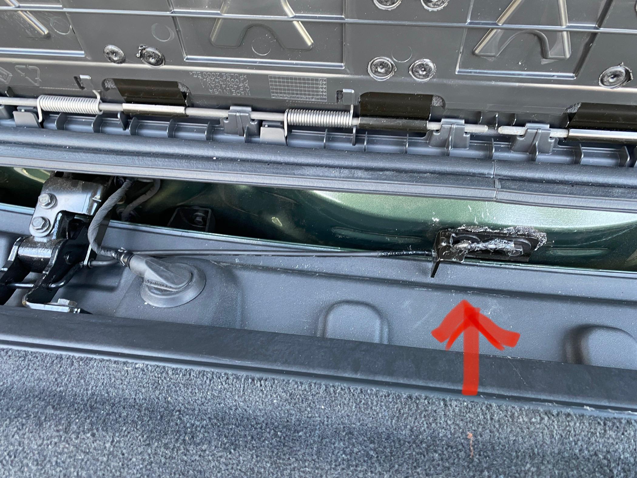 Rivian R1T R1S Torsion bar under tailgate flap after1