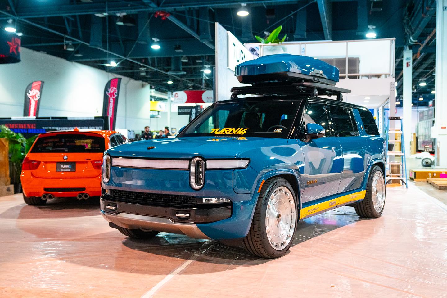 Rivian R1T R1S Lowrider Rivian R1S Build w/ Roof Rack and Cargo Box by Turn14 at SEMA 2023 Rivian R1S build SEMA 2023 3