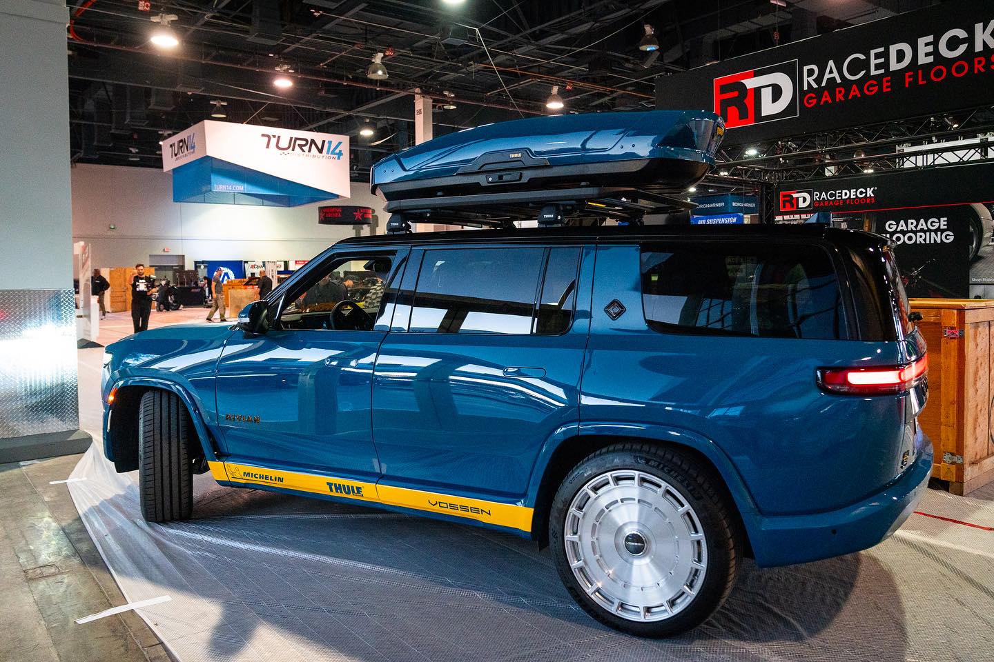 Rivian R1T R1S Lowrider Rivian R1S Build w/ Roof Rack and Cargo Box by Turn14 at SEMA 2023 Rivian R1S build SEMA 2023 4