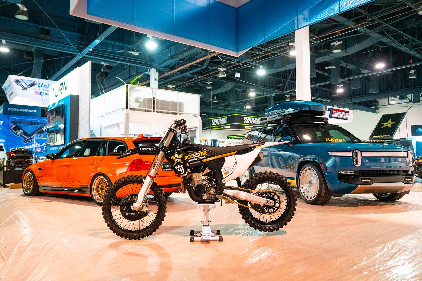 Rivian R1T R1S Lowrider Rivian R1S Build w/ Roof Rack and Cargo Box by Turn14 at SEMA 2023 Rivian R1S build SEMA 2023 2