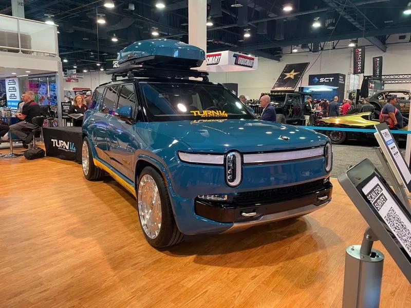 Rivian R1T R1S Lowrider Rivian R1S Build w/ Roof Rack and Cargo Box by Turn14 at SEMA 2023 Rivian R1S build SEMA 2023 1