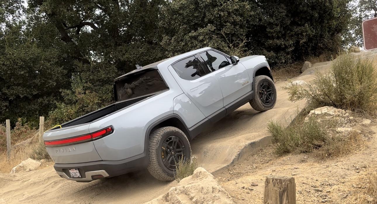 Rivian R1T R1S While the R1T drives up Hell's Gate the Cybertruck can't make it up this little mud hill. IMG_7197