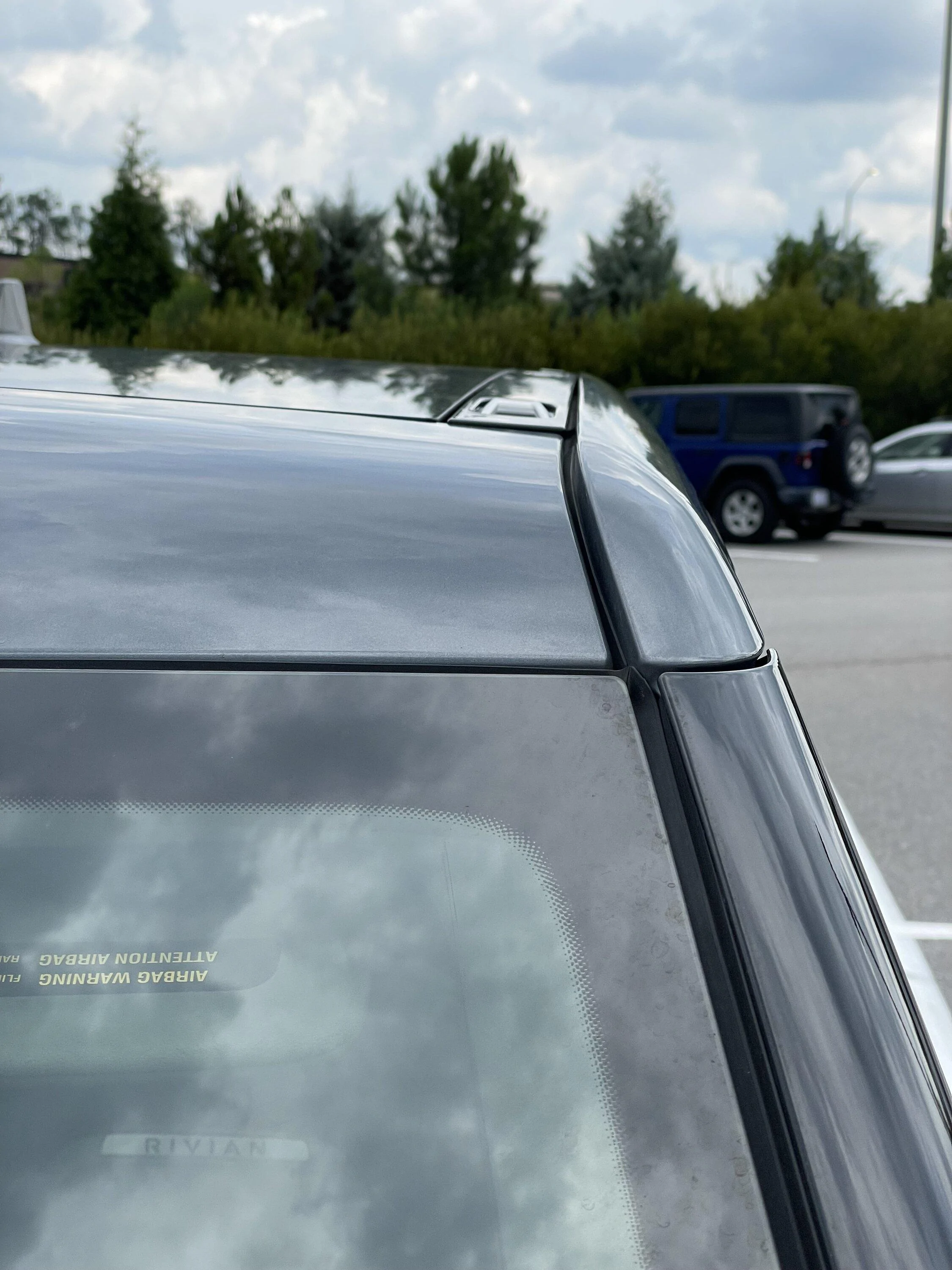 Rivian R1T R1S Service center cannot correct wind noise. How to proceed? IMG_0146