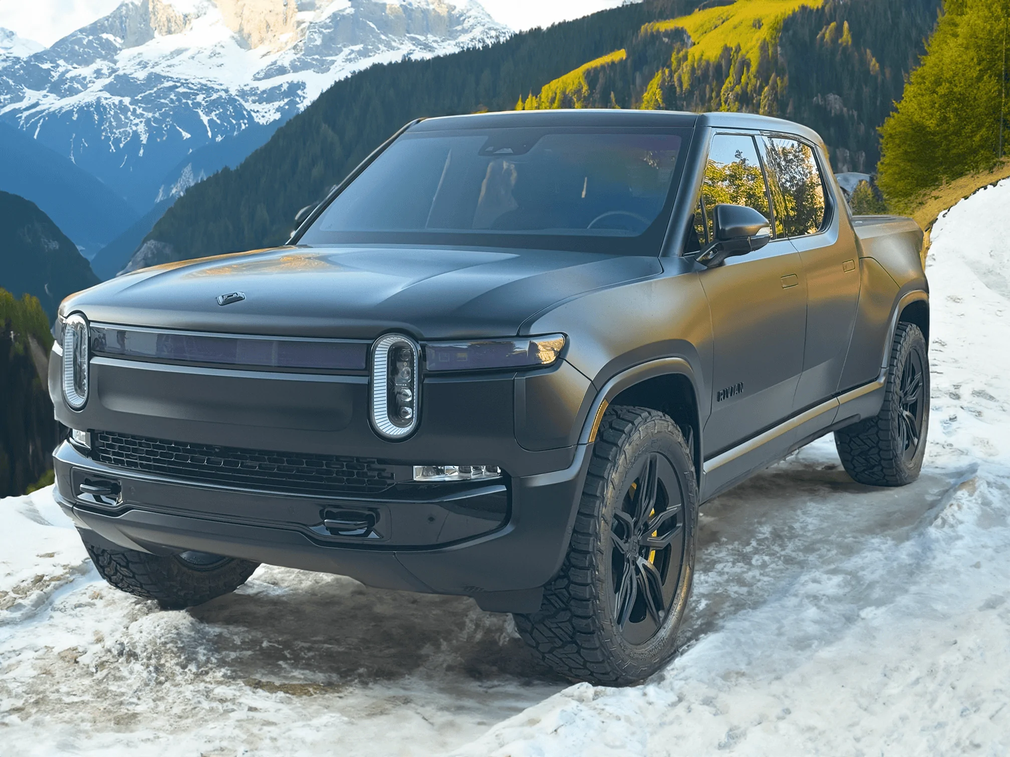 Rivian R1T R1S Project Midnight R1T in-mountains-on-snow-small-png