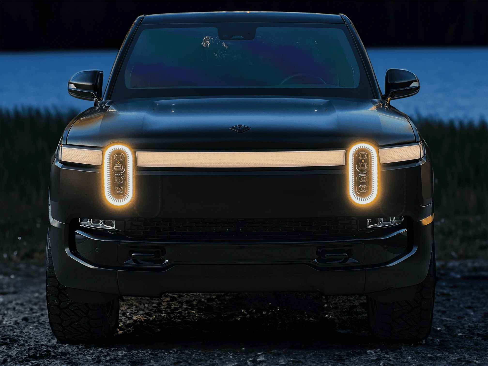 Rivian R1T R1S Project Midnight R1T Front Lake at Night small