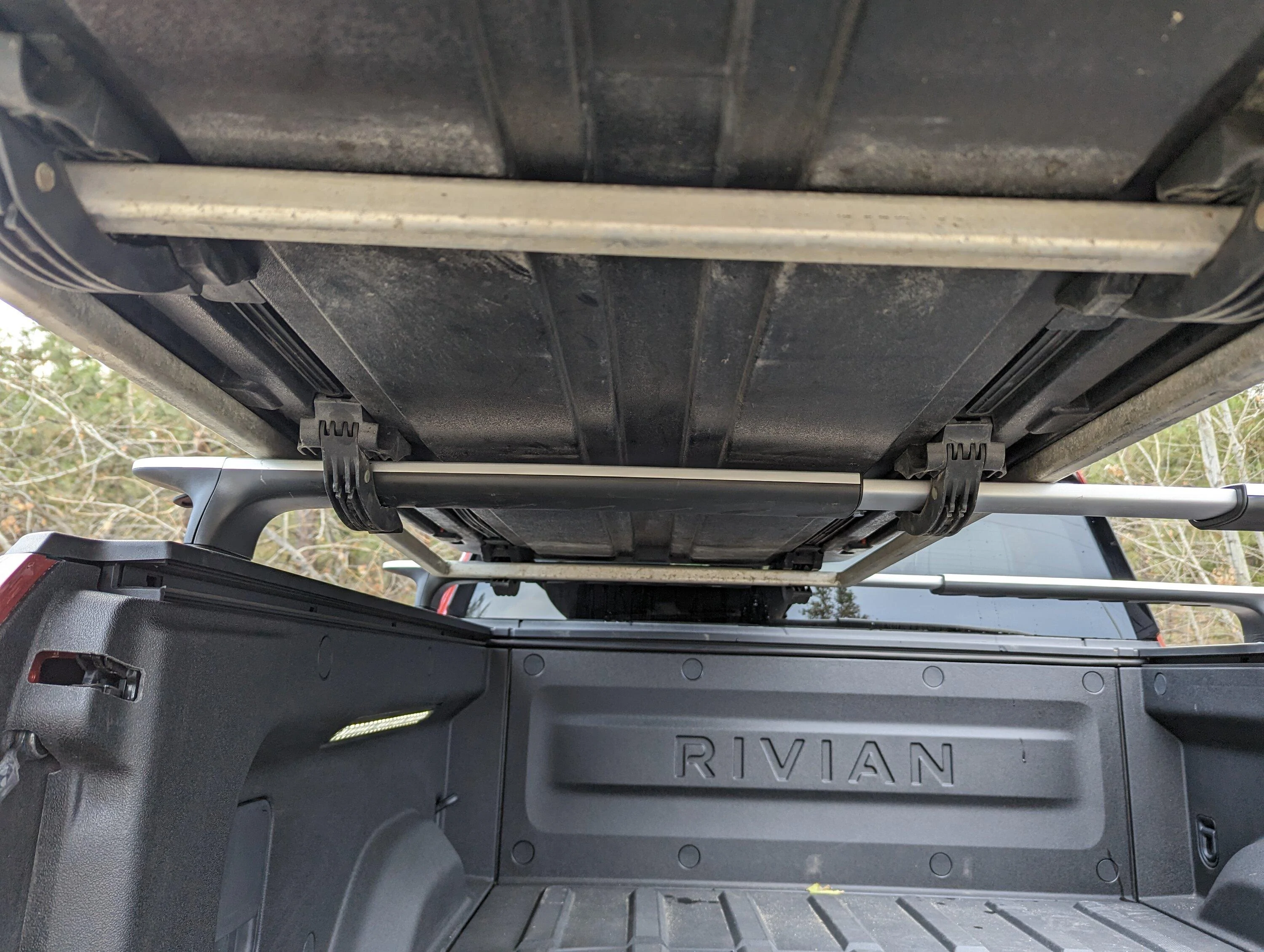 Rivian R1T R1S Yakima Carbonite ski box installation over bed PXL_20231120_170821846.LONG_EXPOSURE-02.ORIGINAL