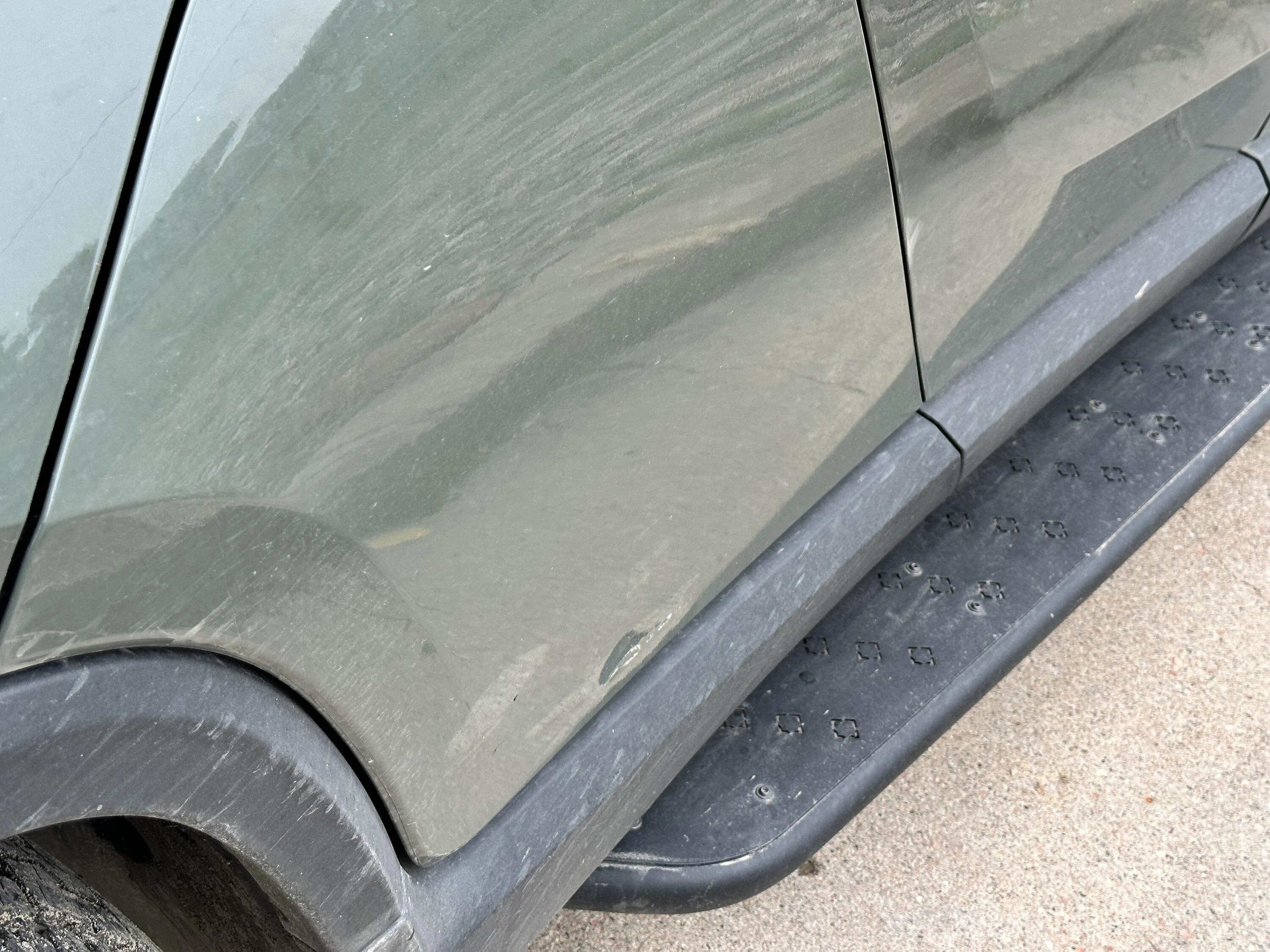 Rivian R1T R1S Advice on Gear Tunnel door dent IMG_2463