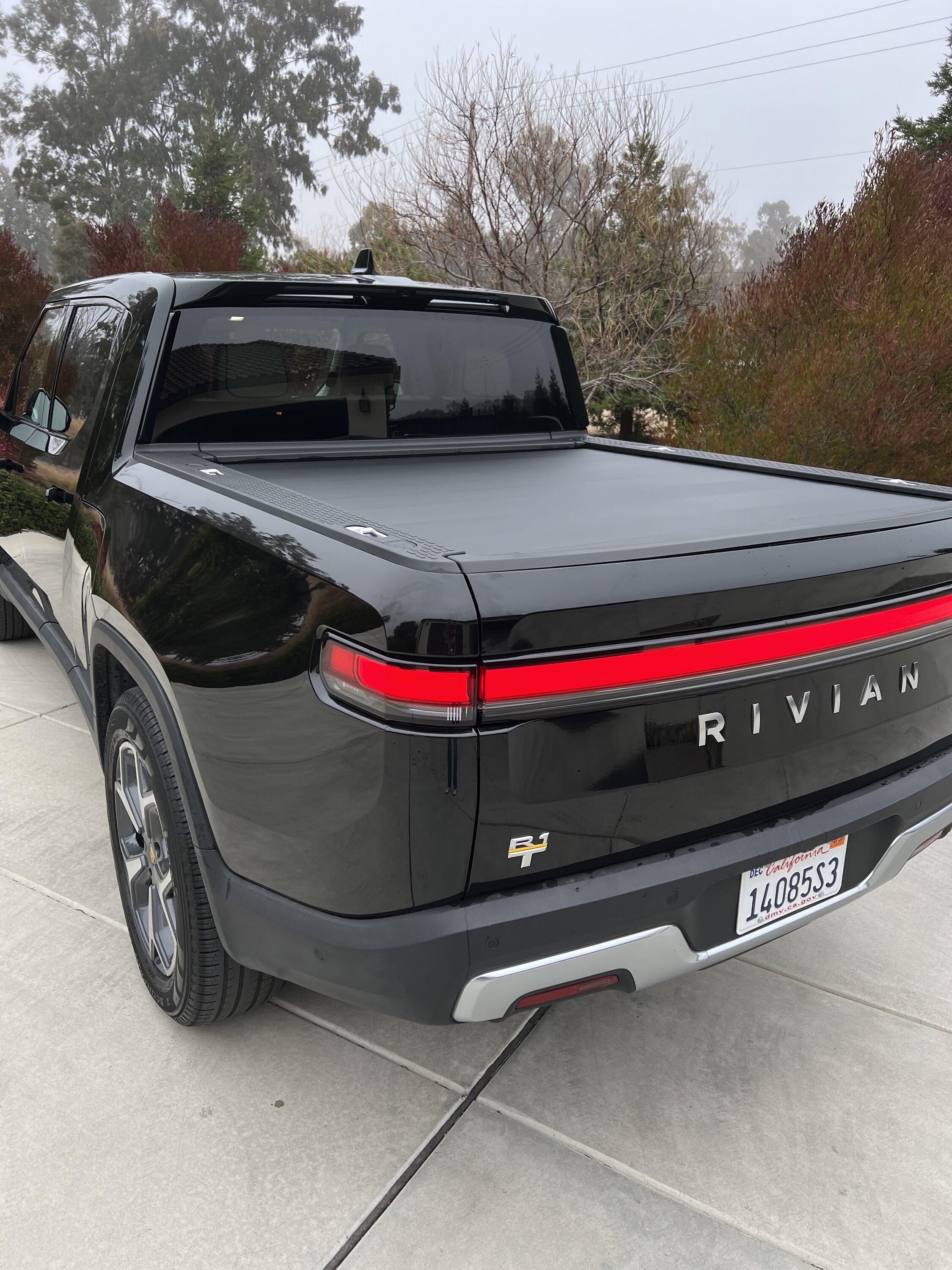 Rivian R1T R1S 2022 R1T Adventure Package-  $72,000  -Midnight Exterior, Ocean Coast Interior Photo Dec 08 2023, 9 45 47 AM