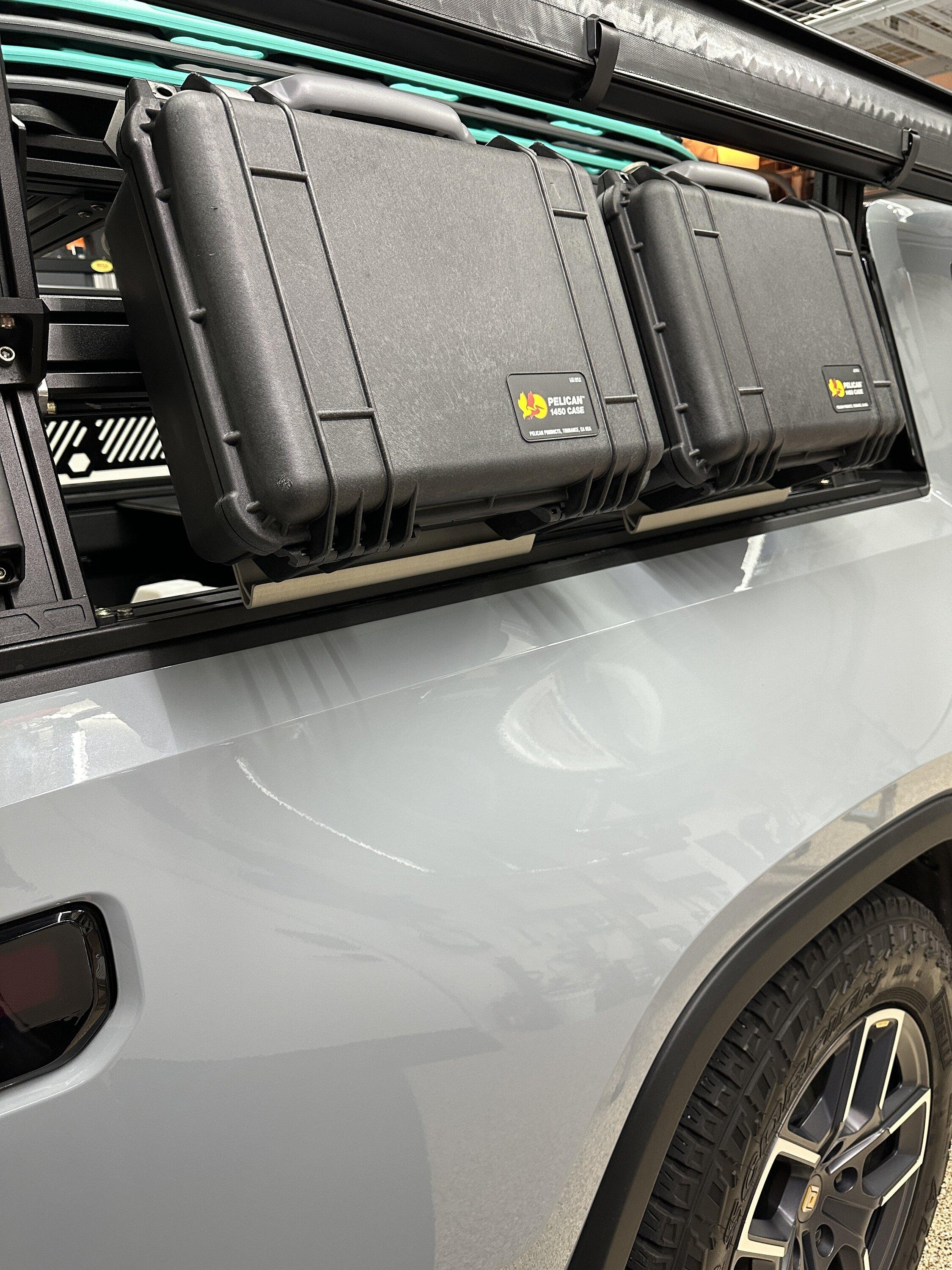Rivian R1T R1S The Mounting Company's Pelican Boxes mounted on Xtrusion Overland Bed Rack IMG_1283