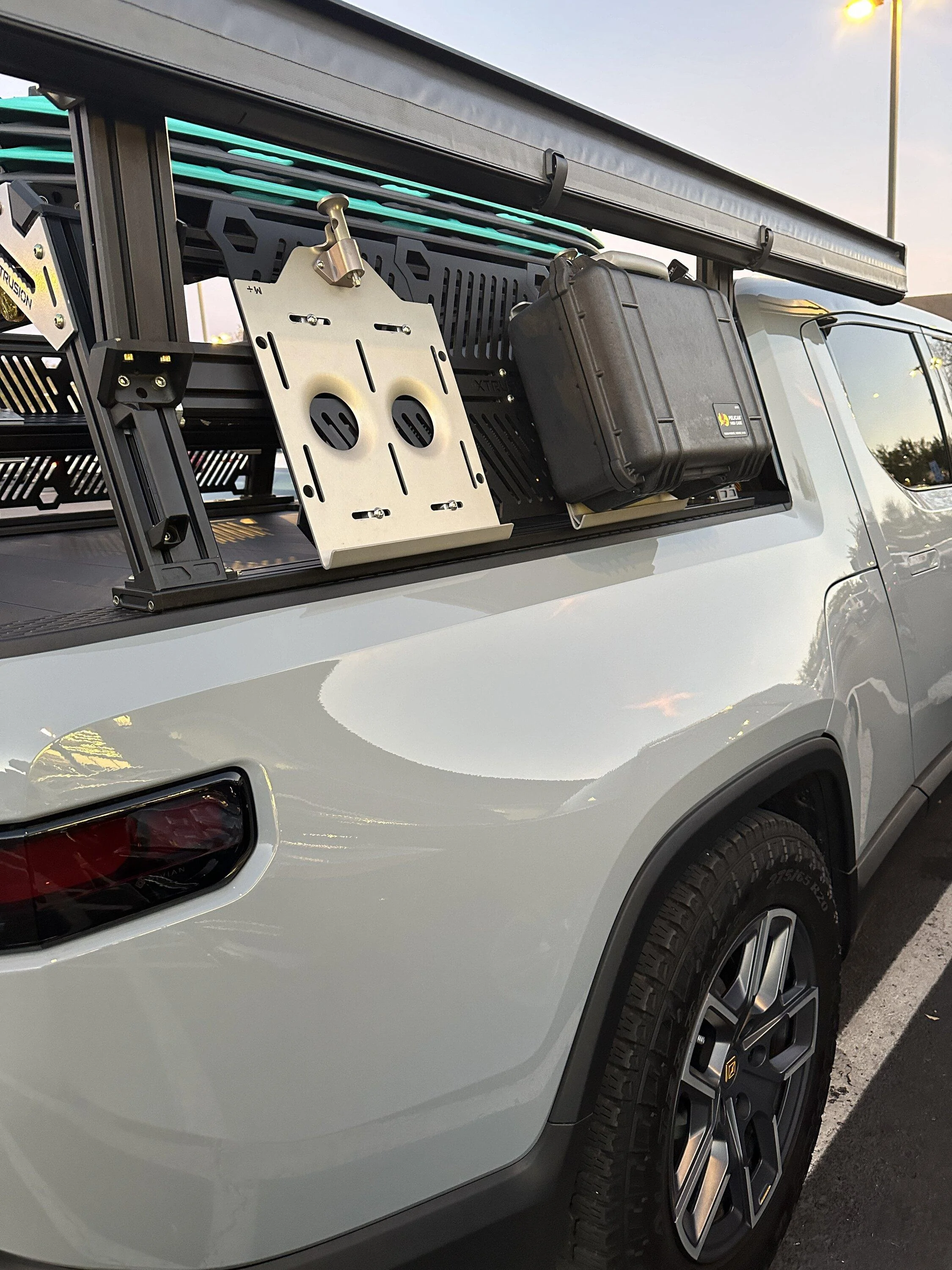 Rivian R1T R1S The Mounting Company's Pelican Boxes mounted on Xtrusion Overland Bed Rack IMG_1287