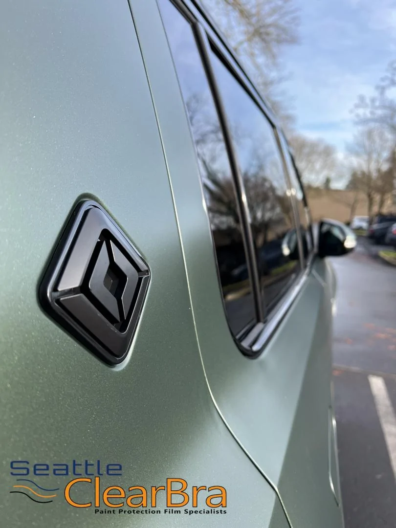 Rivian R1T R1S Transforming a Rivian: From Glossy to Stealth with Seattle ClearBra's Expertise rivian-ris-launch-green-xpel-stealth-clear-bra-ppf-pant-protection-film-seattle-clearbra-20