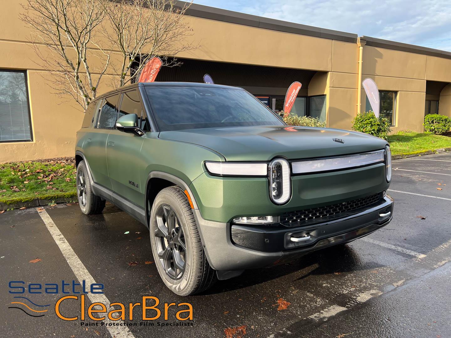 Rivian R1T R1S Transforming a Rivian: From Glossy to Stealth with Seattle ClearBra's Expertise rivian-ris-launch-green-xpel-stealth-clear-bra-ppf-pant-protection-film-seattle-clearbra-36