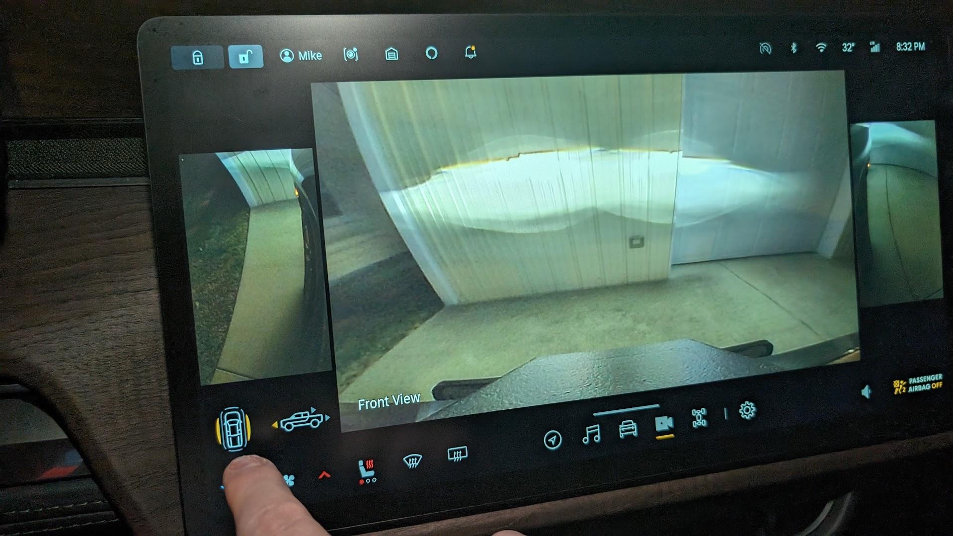 Rivian R1T R1S How to have front and rear cameras on while driving? 1703107006110