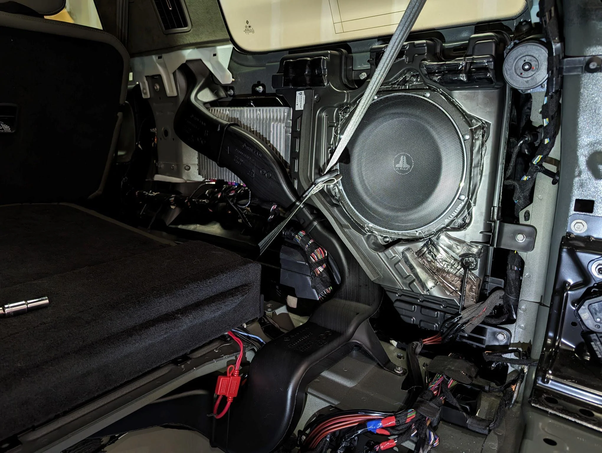 Rivian R1T R1S Upgraded the sub in R1S with aftermarket Alpine SWR-T10 Subwoofer installed