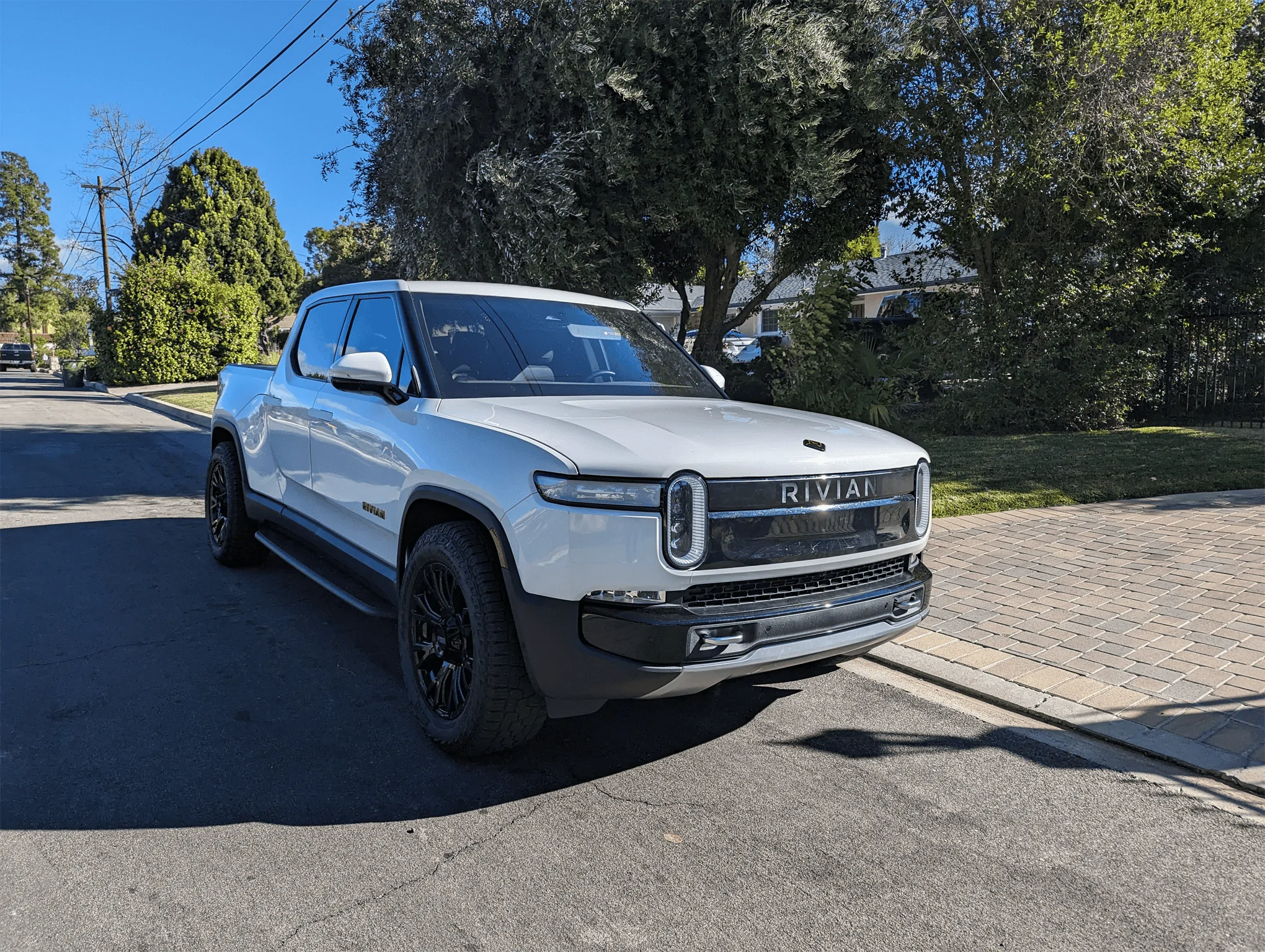 Rivian R1T R1S UPDATE: Blackout lightbar decal added + applied vinyl to break up the controversial front end on my Rivian 1704652990797-png