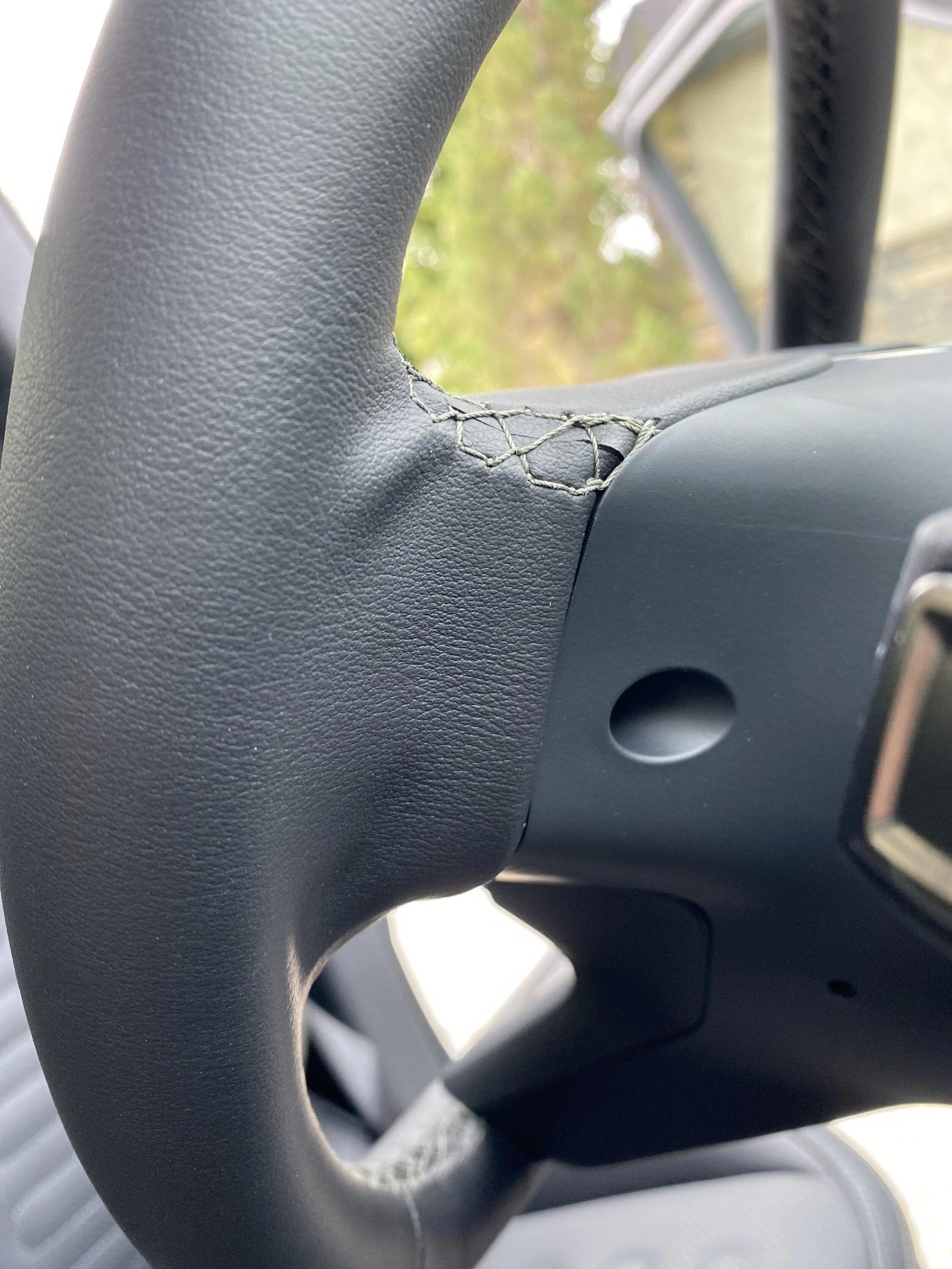 Rivian R1T R1S What's with the horrible steering wheel quality? IMG_3707