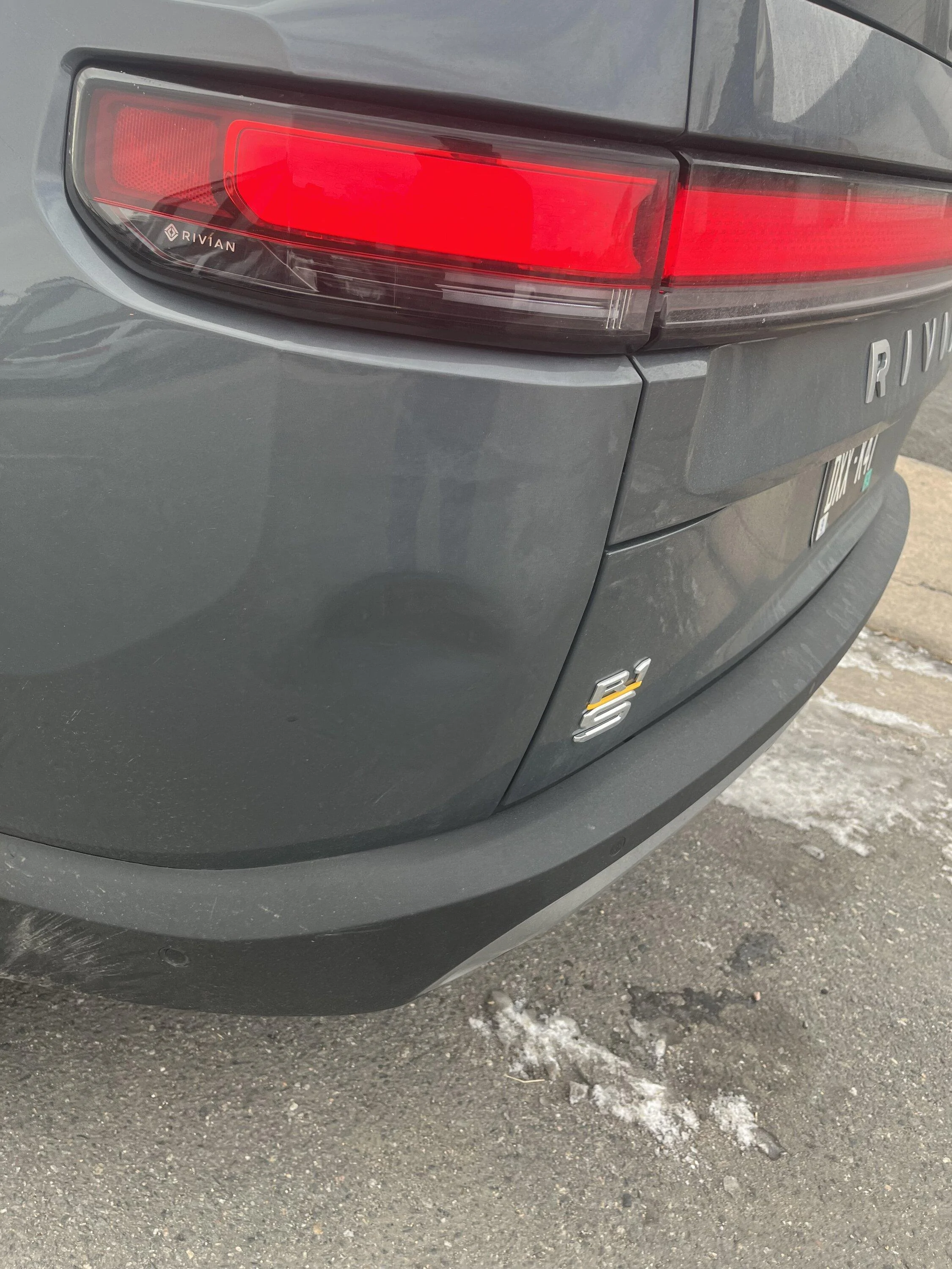 Rivian R1T R1S First dent - any trouble accessing behind the quarter panel?  :( IMG_0453