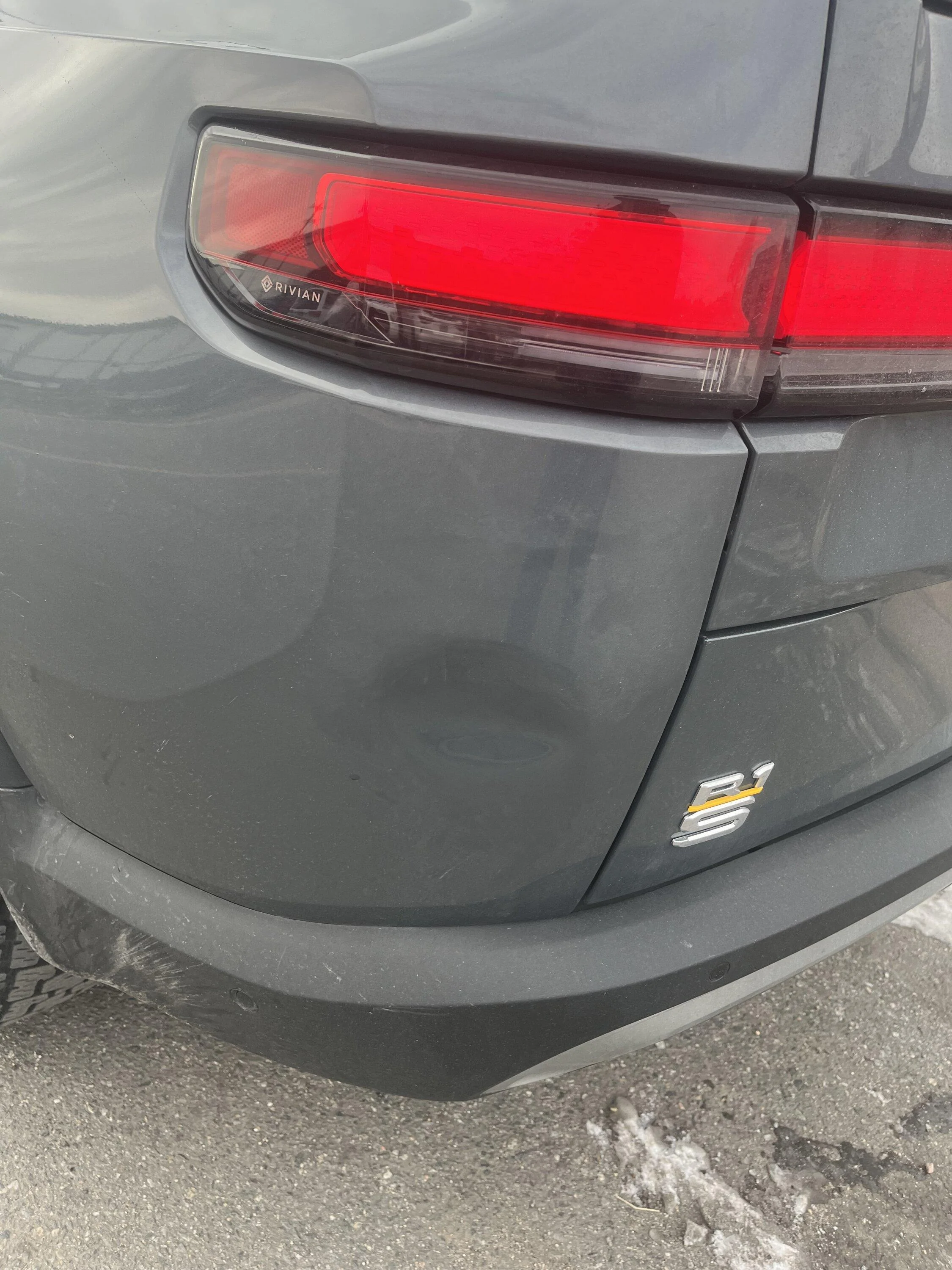 Rivian R1T R1S First dent - any trouble accessing behind the quarter panel?  :( IMG_0452