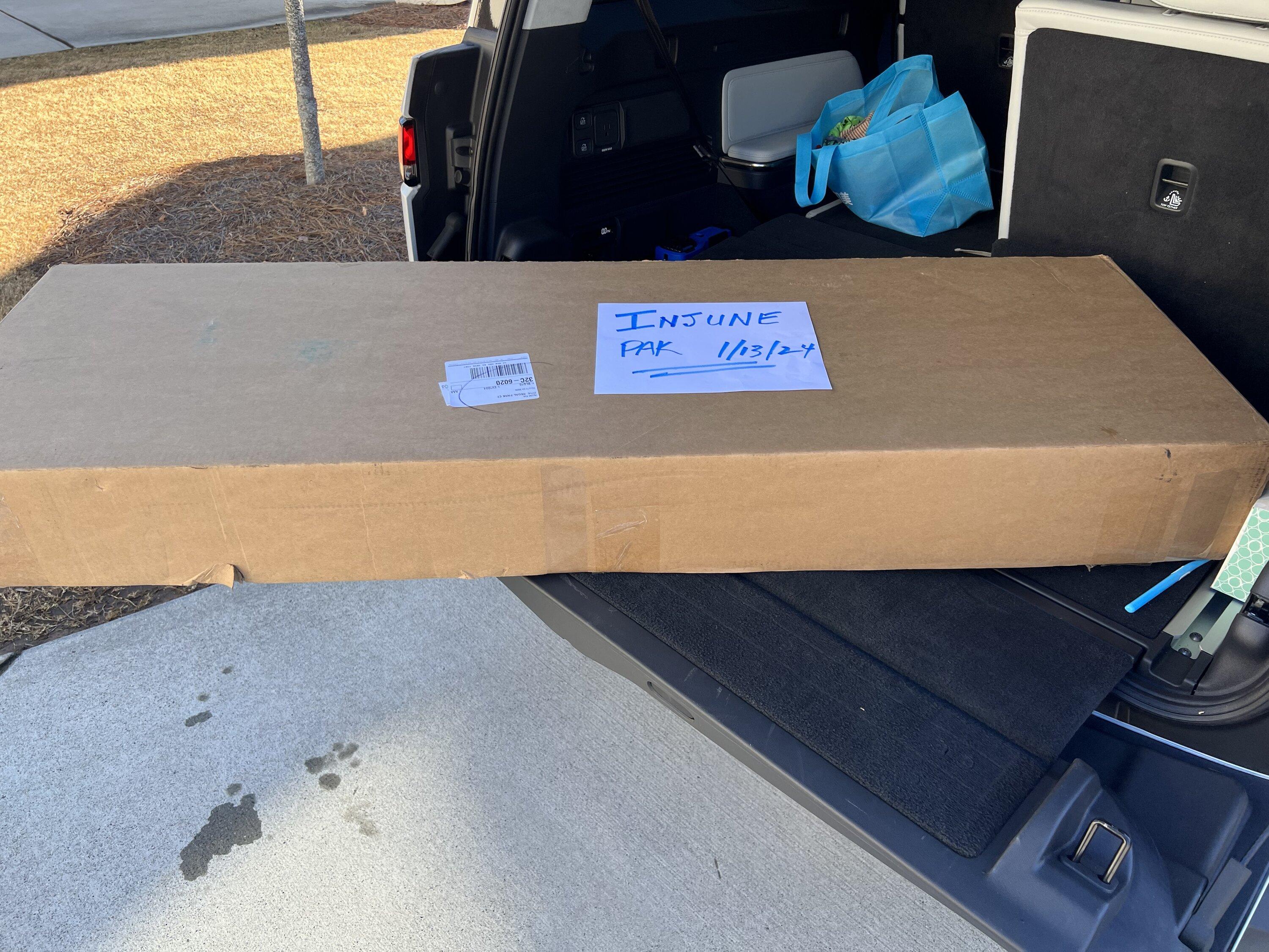 Rivian R1T R1S Rivian OEM manual tonneau cover F1CF10EB-2D7D-4407-B940-872FDC40DA76