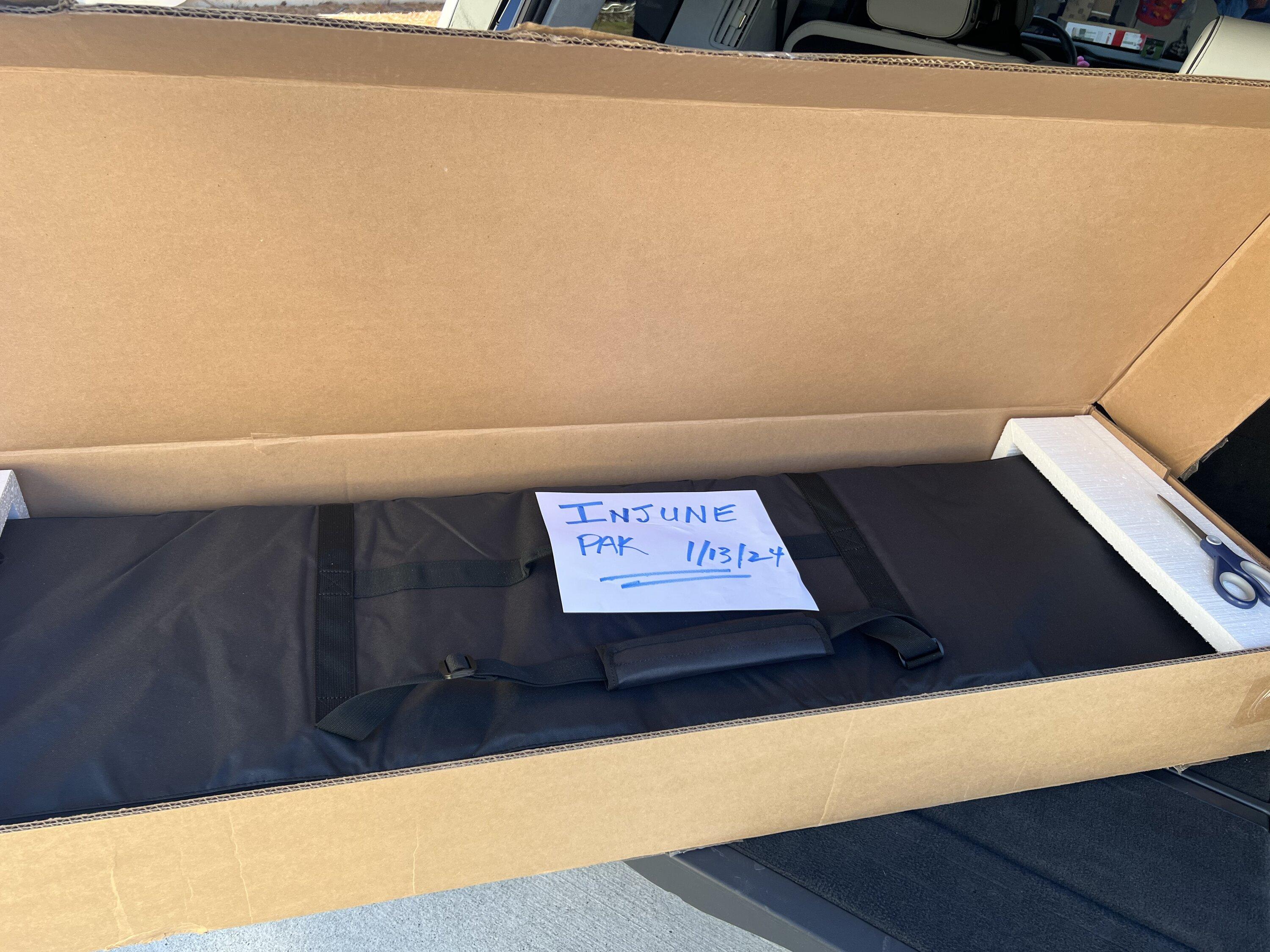 Rivian R1T R1S Rivian OEM manual tonneau cover 5CCAF462-E1B2-4F87-A411-7B0B64CAF777