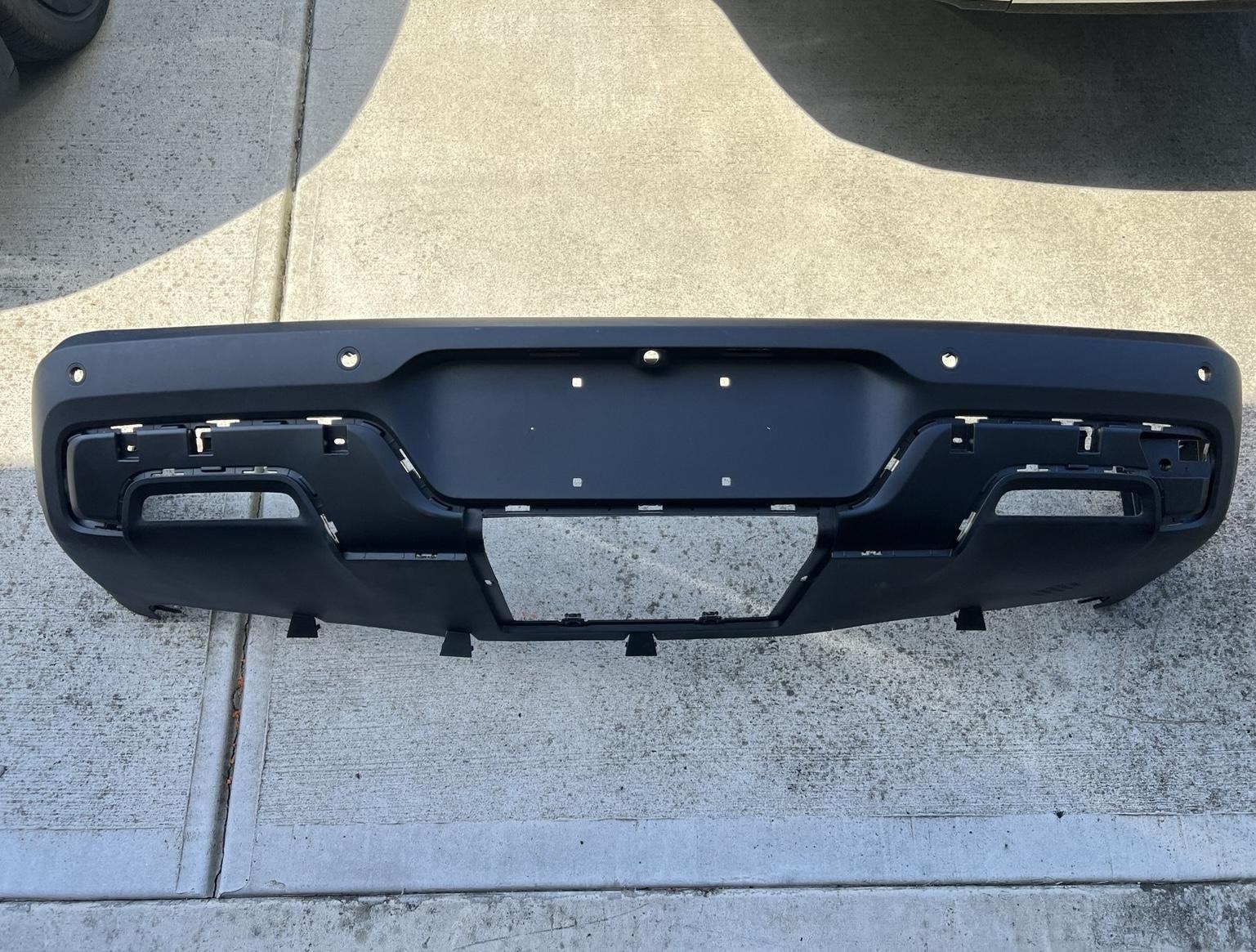 Rivian R1T R1S R1T rear bumper assembly A4BF56F7-603F-4DB2-85B7-8F98C99E3968