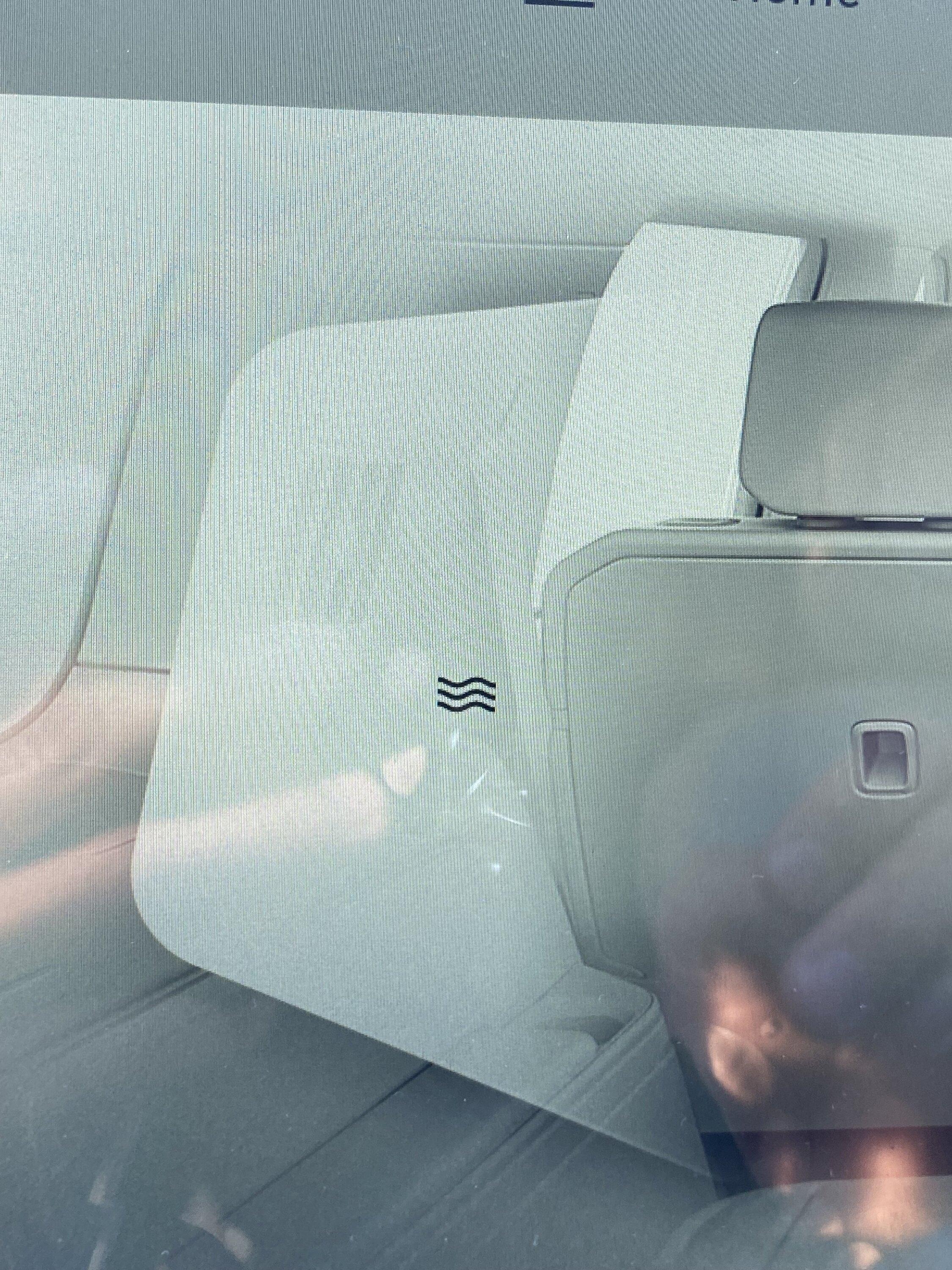 Rivian R1T R1S What’s this meaning in 3rd row IMG_7611