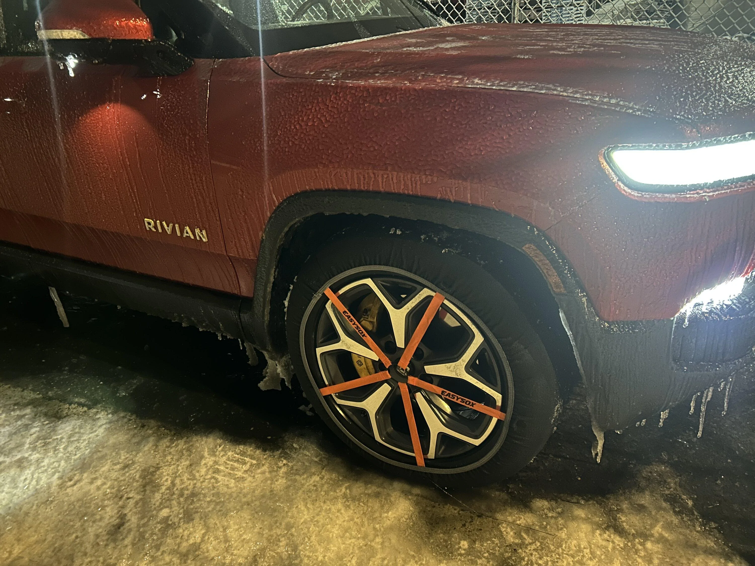 Rivian R1T R1S Snow socks on ice -- impressive performance IMG_2427
