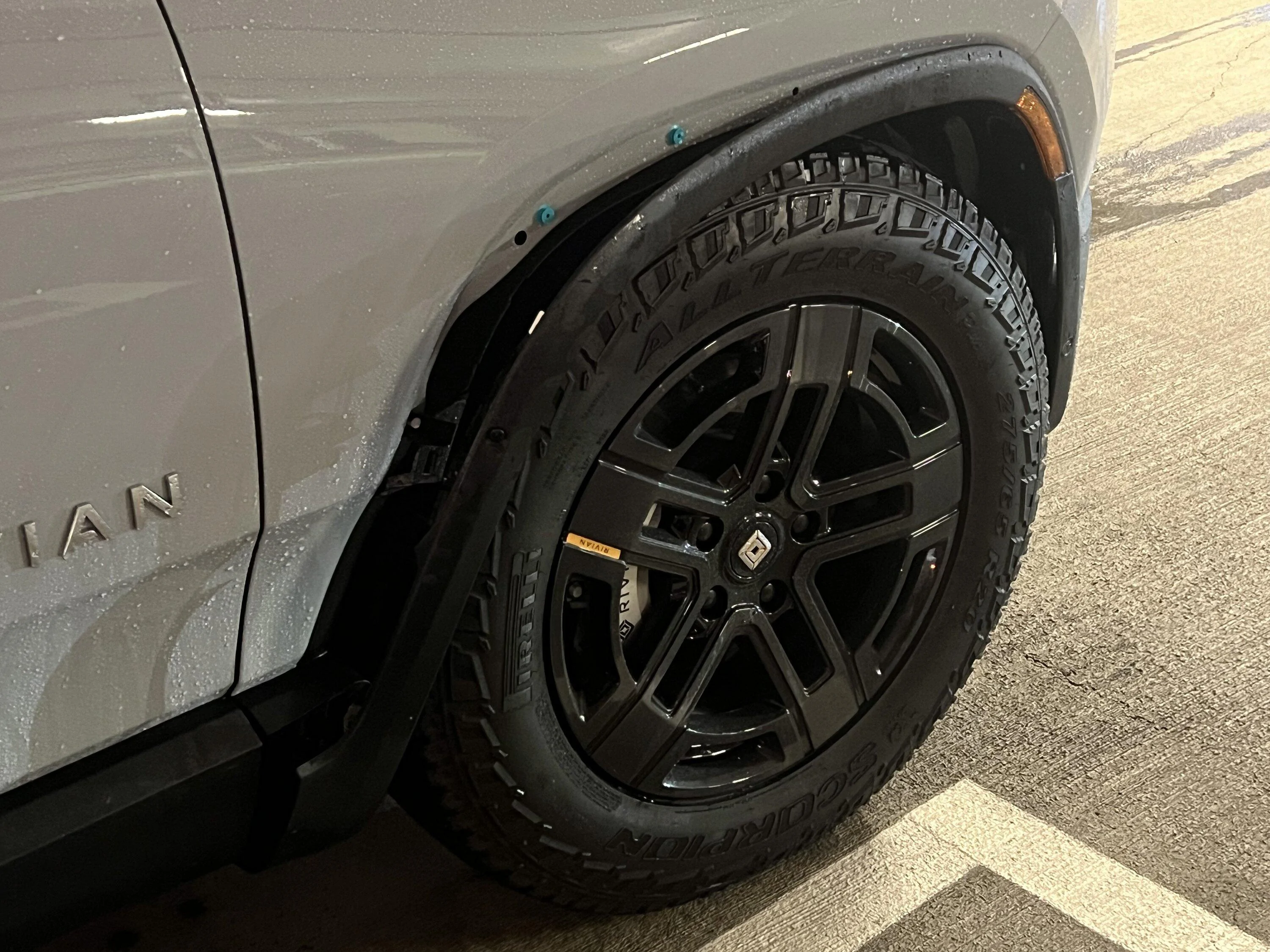 Rivian R1T R1S Trim (Fender Flare) dislodged from a puddle IMG_3130