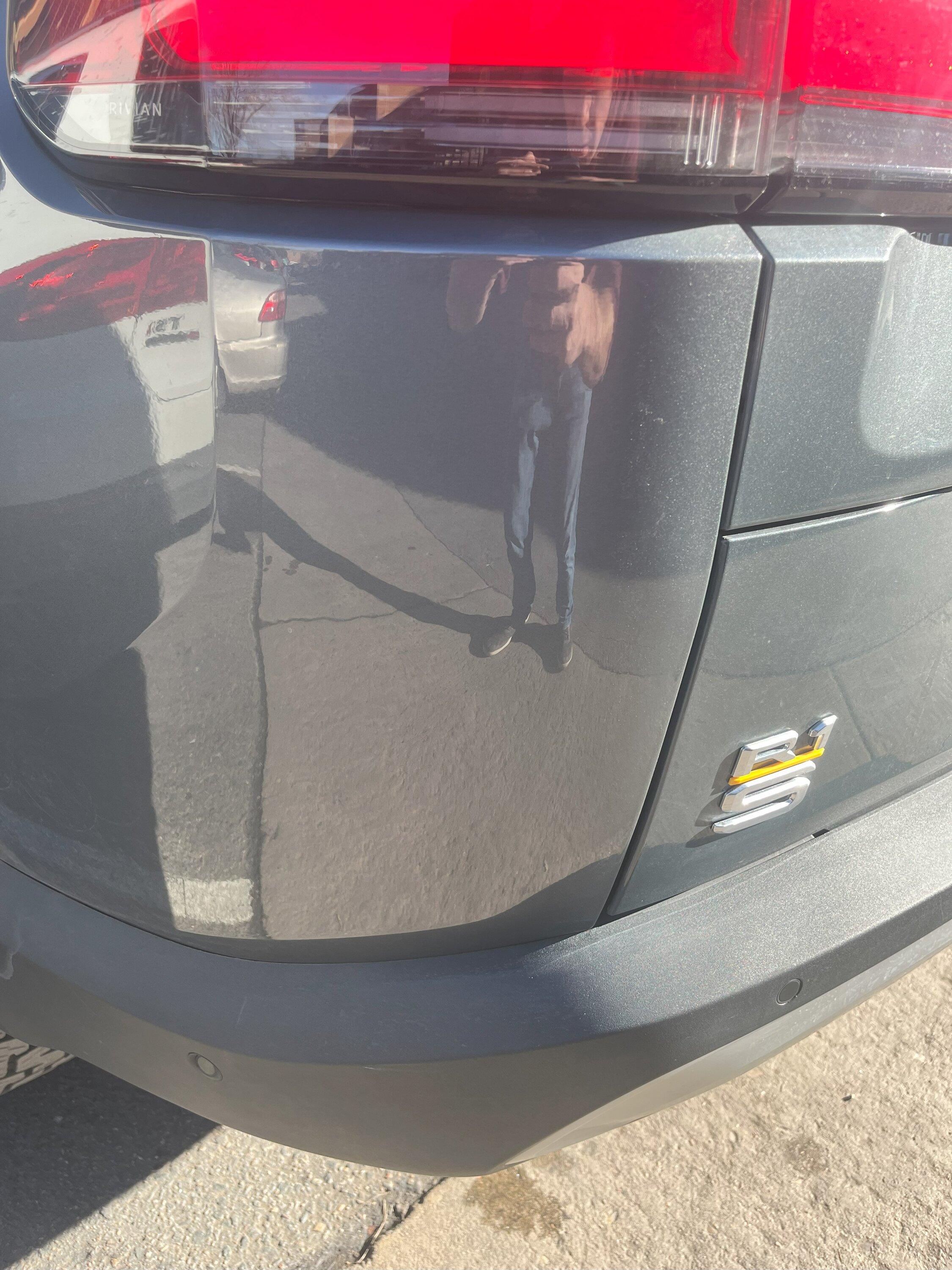 Rivian R1T R1S First dent - any trouble accessing behind the quarter panel?  :( IMG_0495