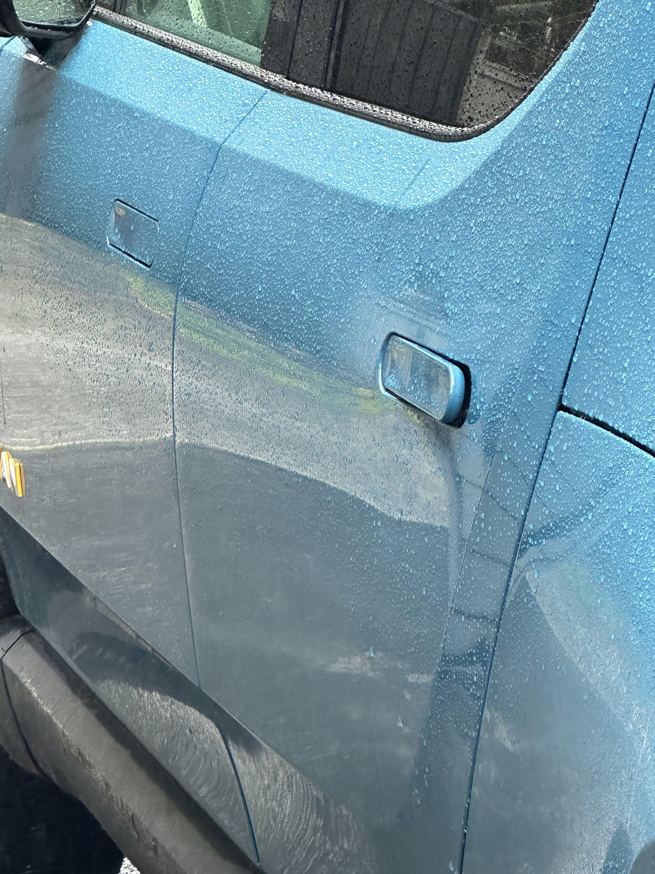 Rivian R1T R1S Door Handle won't pop back down IMG_8385.JPG