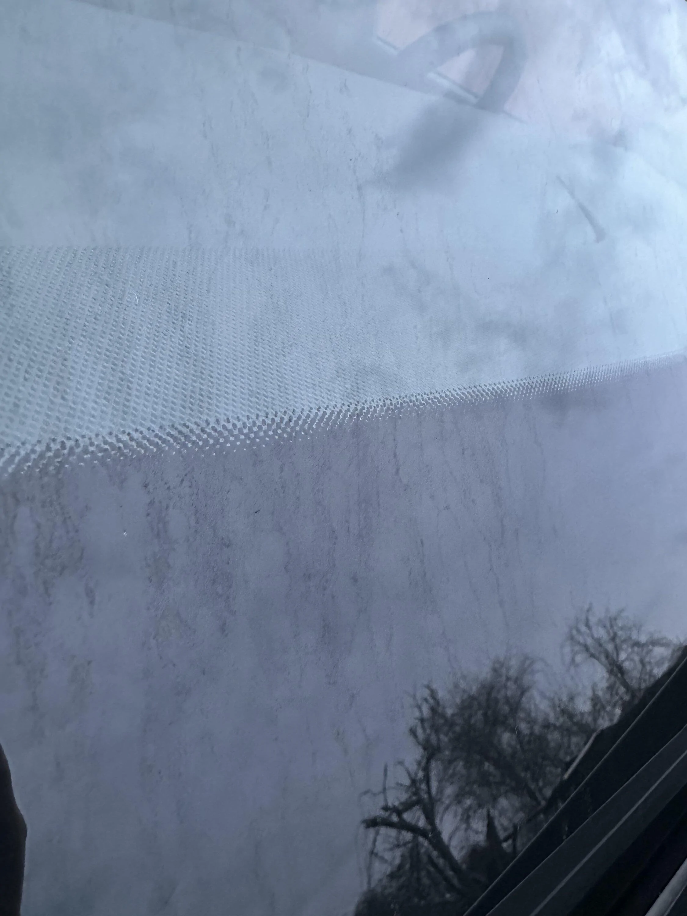 Rivian R1T R1S R1S Used Bug Cleaner on Windshield, surface now damaged IMG_0995