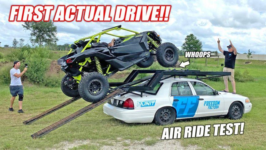 Rivian R1T R1S Snowmobile in R1T bed with deck / bed extender -- fits and performs well florida-man-builds-roof-rack-on