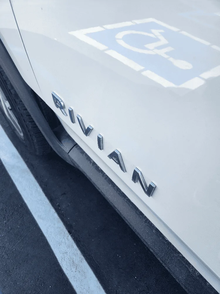 Rivian R1T R1S Yellow trim behind RIVIAN words 20240227_110631