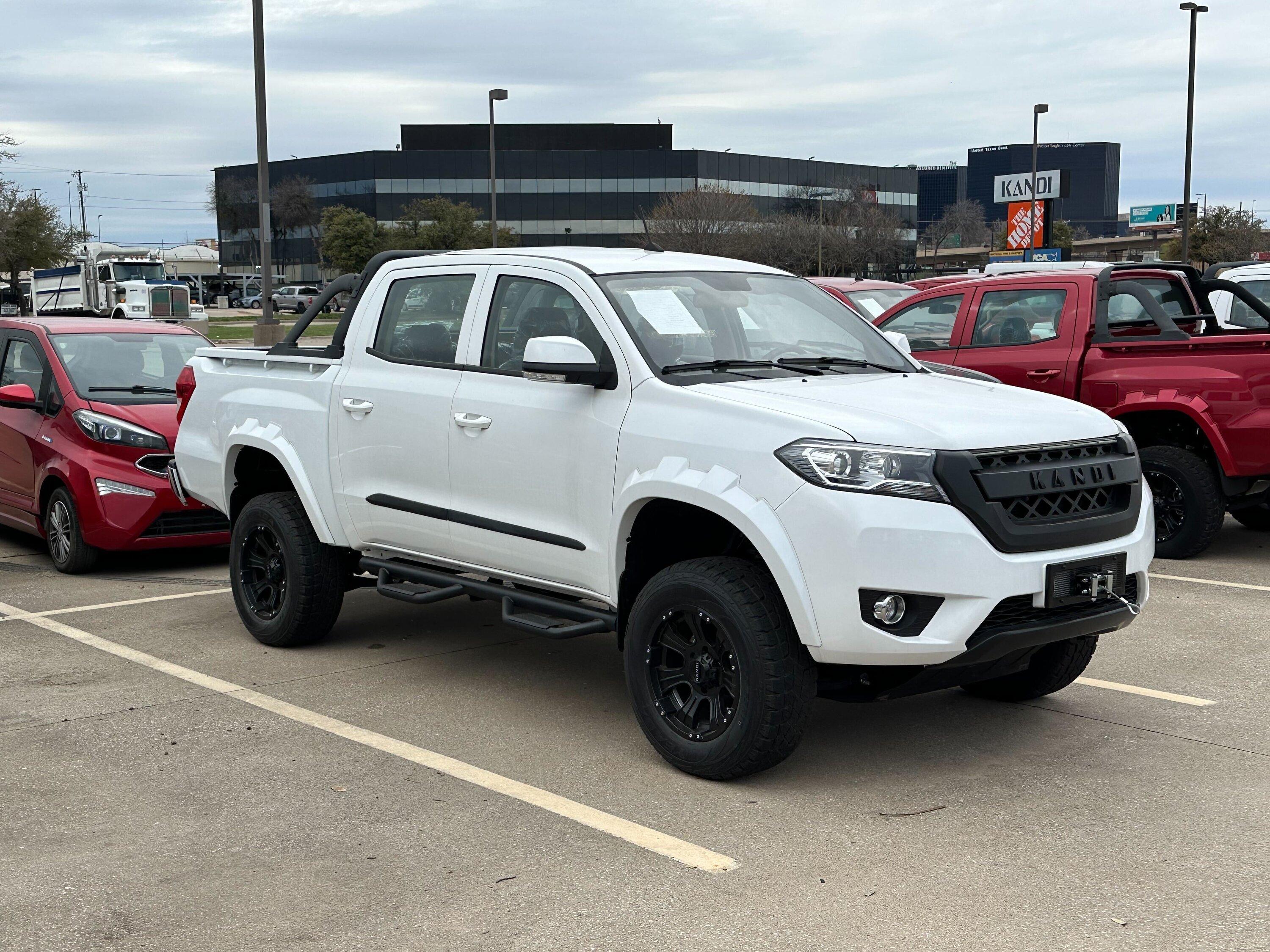 Rivian R1T R1S Found an entire parking lot full of Kandi K32 Pickups Image from iOS (3)