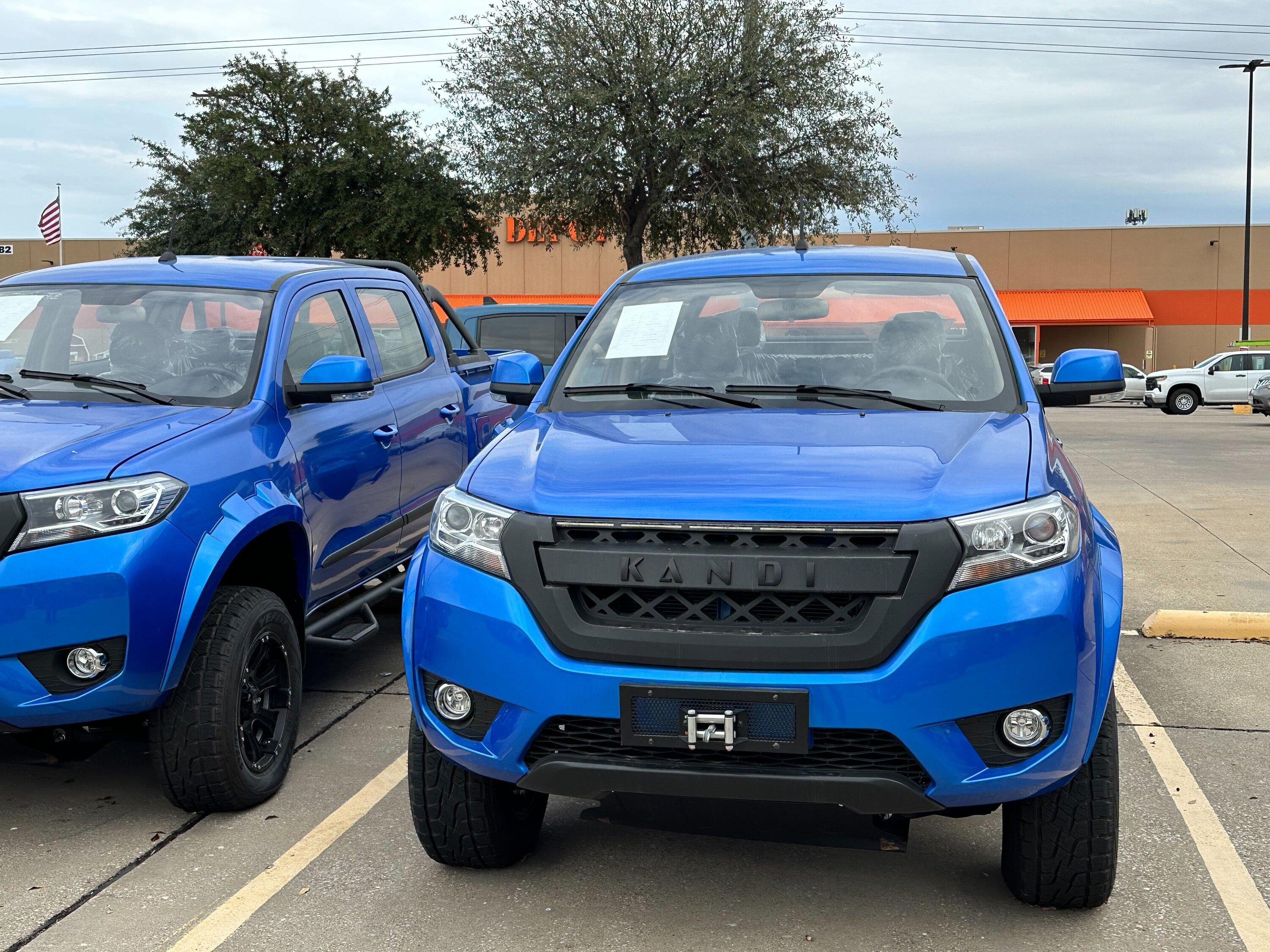 Rivian R1T R1S Found an entire parking lot full of Kandi K32 Pickups Image from iOS