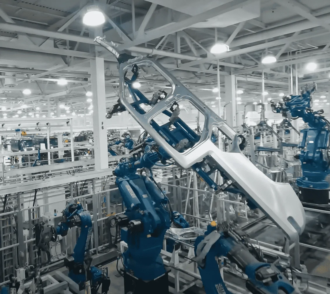 Rivian R1T R1S A "Play by Play Illustrated Commentary" why R2 production would be challenging to retrofit into existing R1 or EDV line 1710089548306