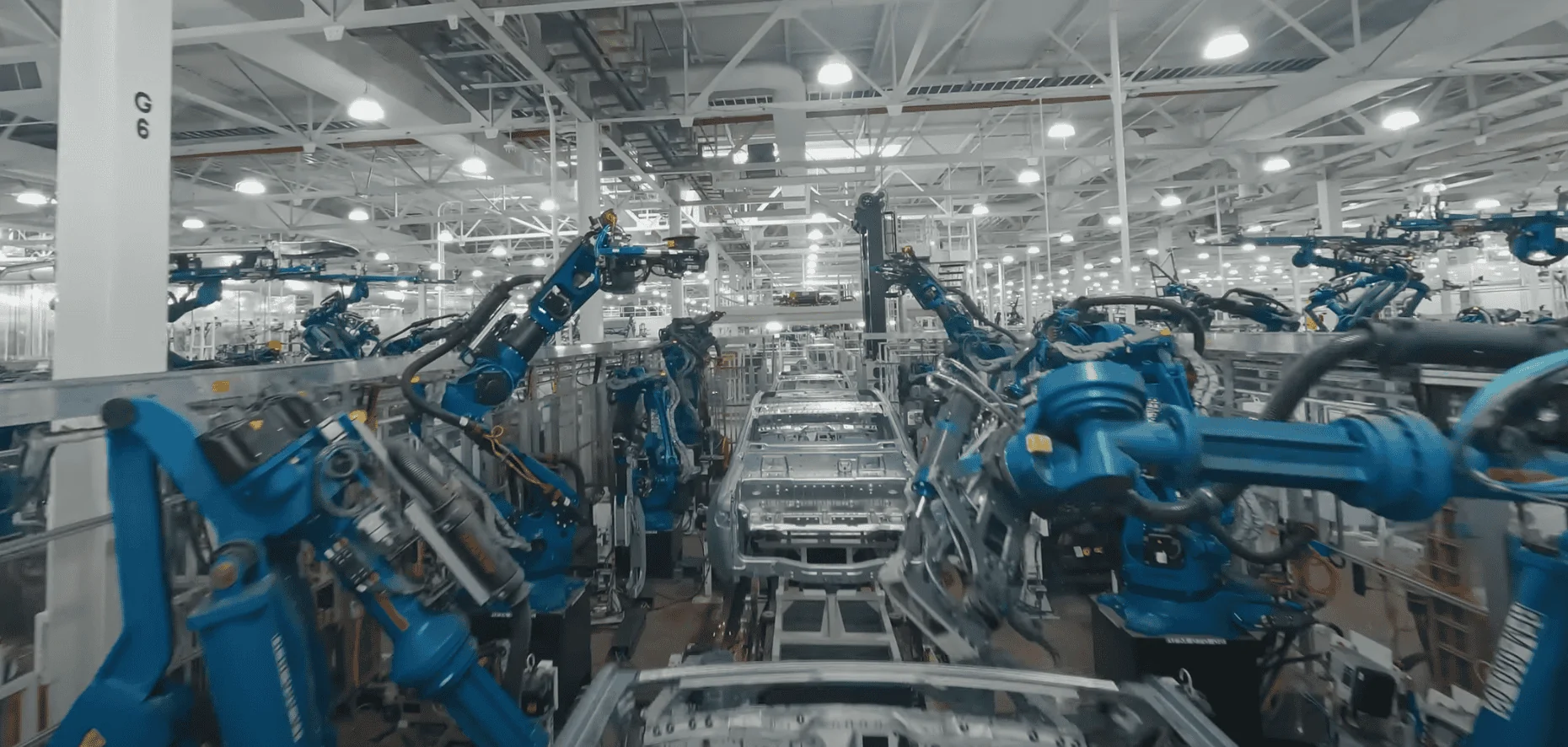 Rivian R1T R1S A "Play by Play Illustrated Commentary" why R2 production would be challenging to retrofit into existing R1 or EDV line 1710089582001