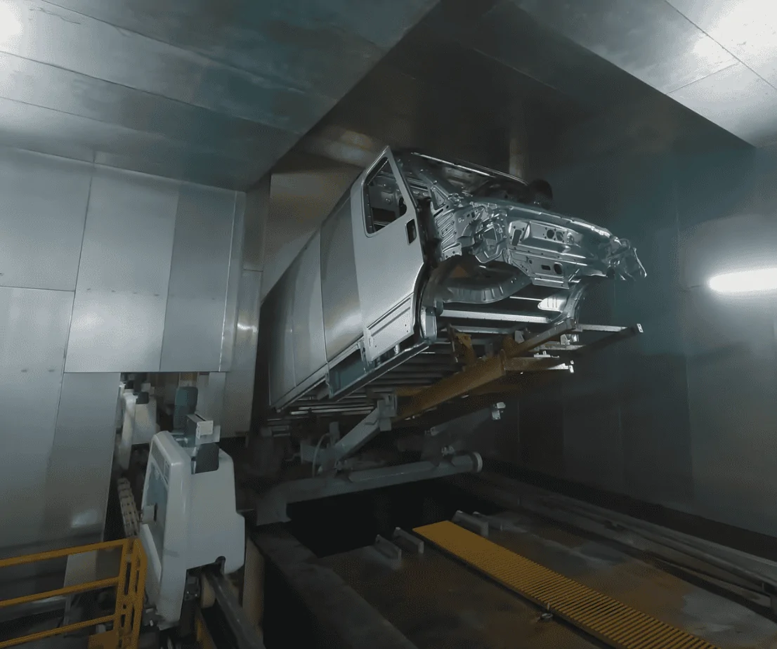 Rivian R1T R1S A "Play by Play Illustrated Commentary" why R2 production would be challenging to retrofit into existing R1 or EDV line 1710089653983