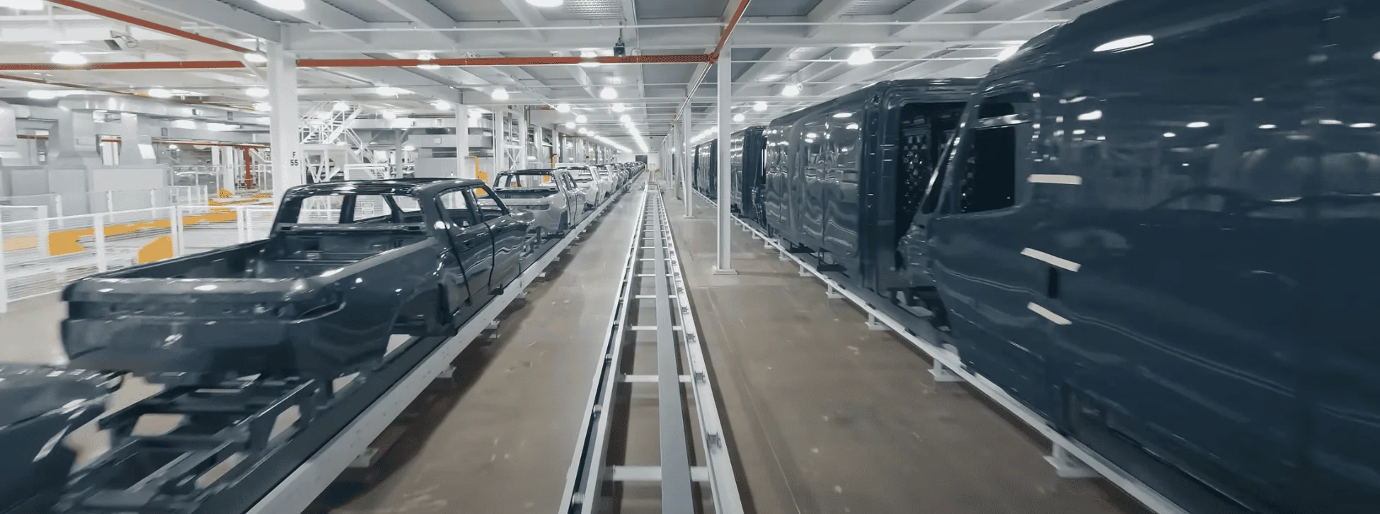 Rivian R1T R1S A "Play by Play Illustrated Commentary" why R2 production would be challenging to retrofit into existing R1 or EDV line 1710089688158