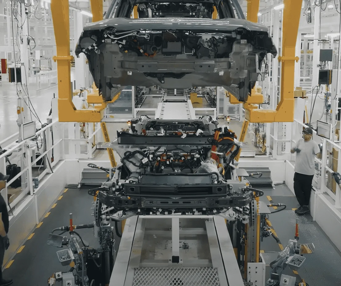 Rivian R1T R1S A "Play by Play Illustrated Commentary" why R2 production would be challenging to retrofit into existing R1 or EDV line 1710089702654