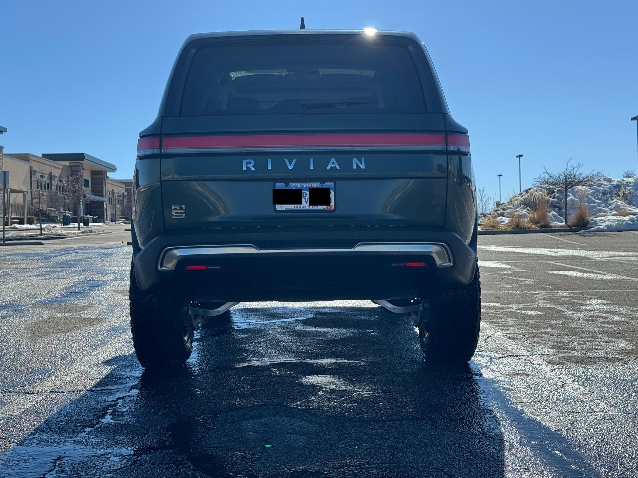 Rivian R1T R1S 35" Yokohama Geolandar M/T G003 on 20" Atomic Wheels on R1S Highest7.JPG