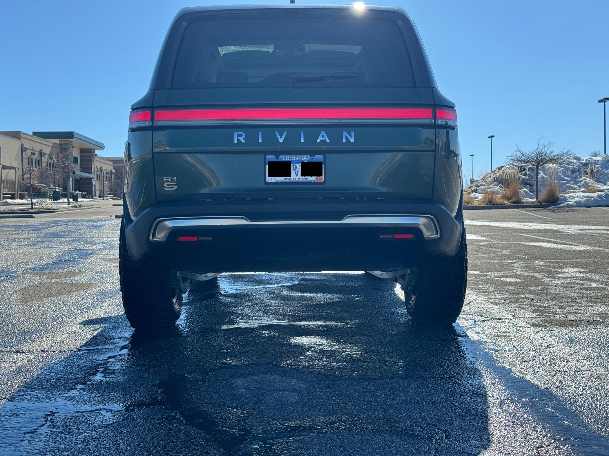 Rivian R1T R1S 35" Yokohama Geolandar M/T G003 on 20" Atomic Wheels on R1S High5.JPG