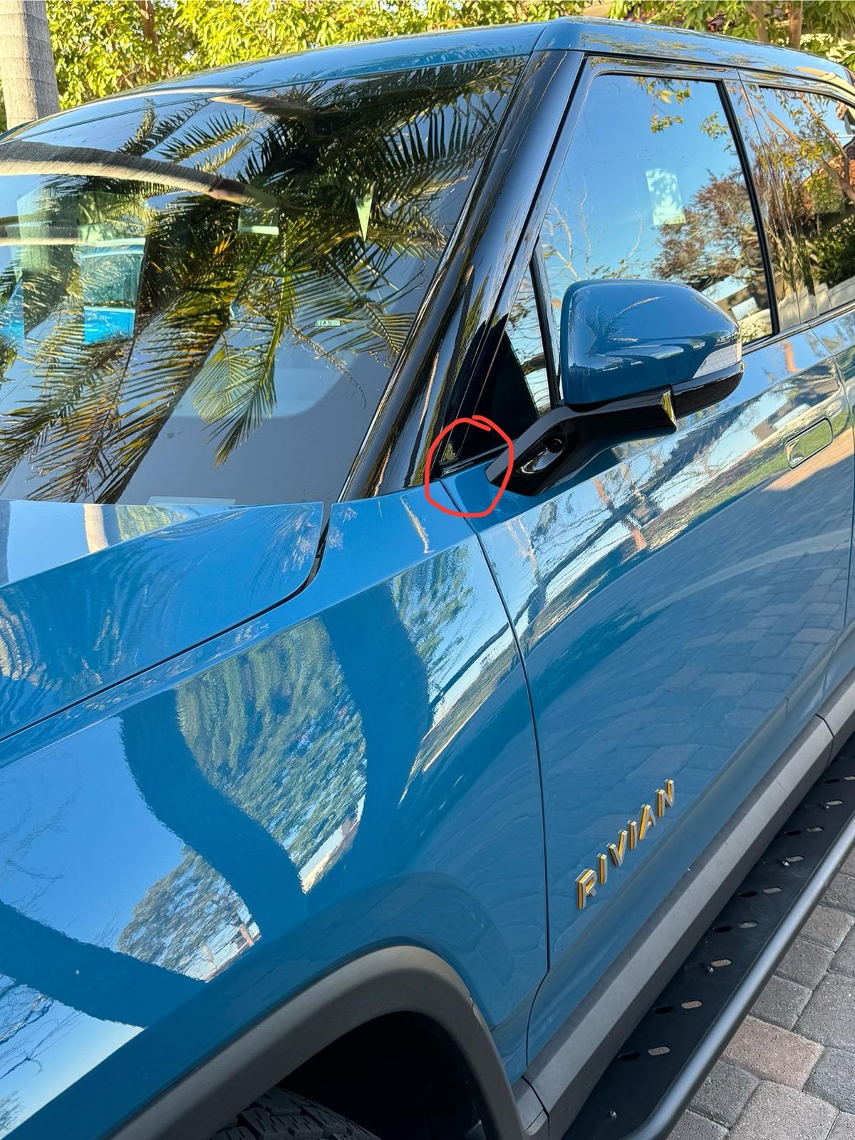 Rivian R1T R1S Resolved (my) excessive wind noise 2023 R1T (cause: corner window plastic trim) IMG_1561