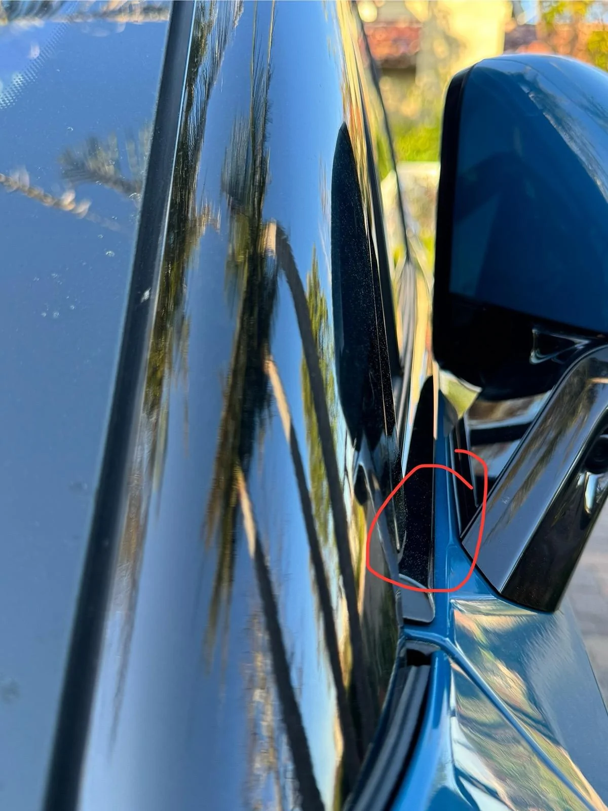 Rivian R1T R1S Resolved (my) excessive wind noise 2023 R1T (cause: corner window plastic trim) IMG_1560