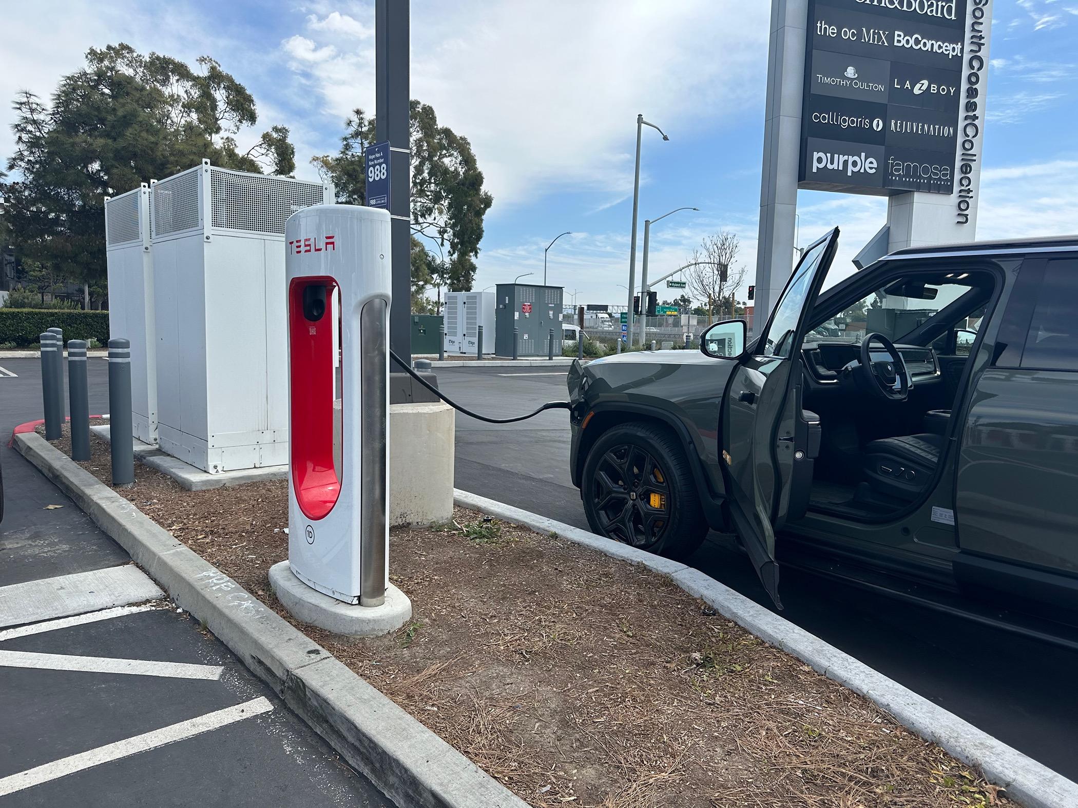 Rivian R1T R1S Let's talk Tesla Supercharger parking etiquette... IMG_9867