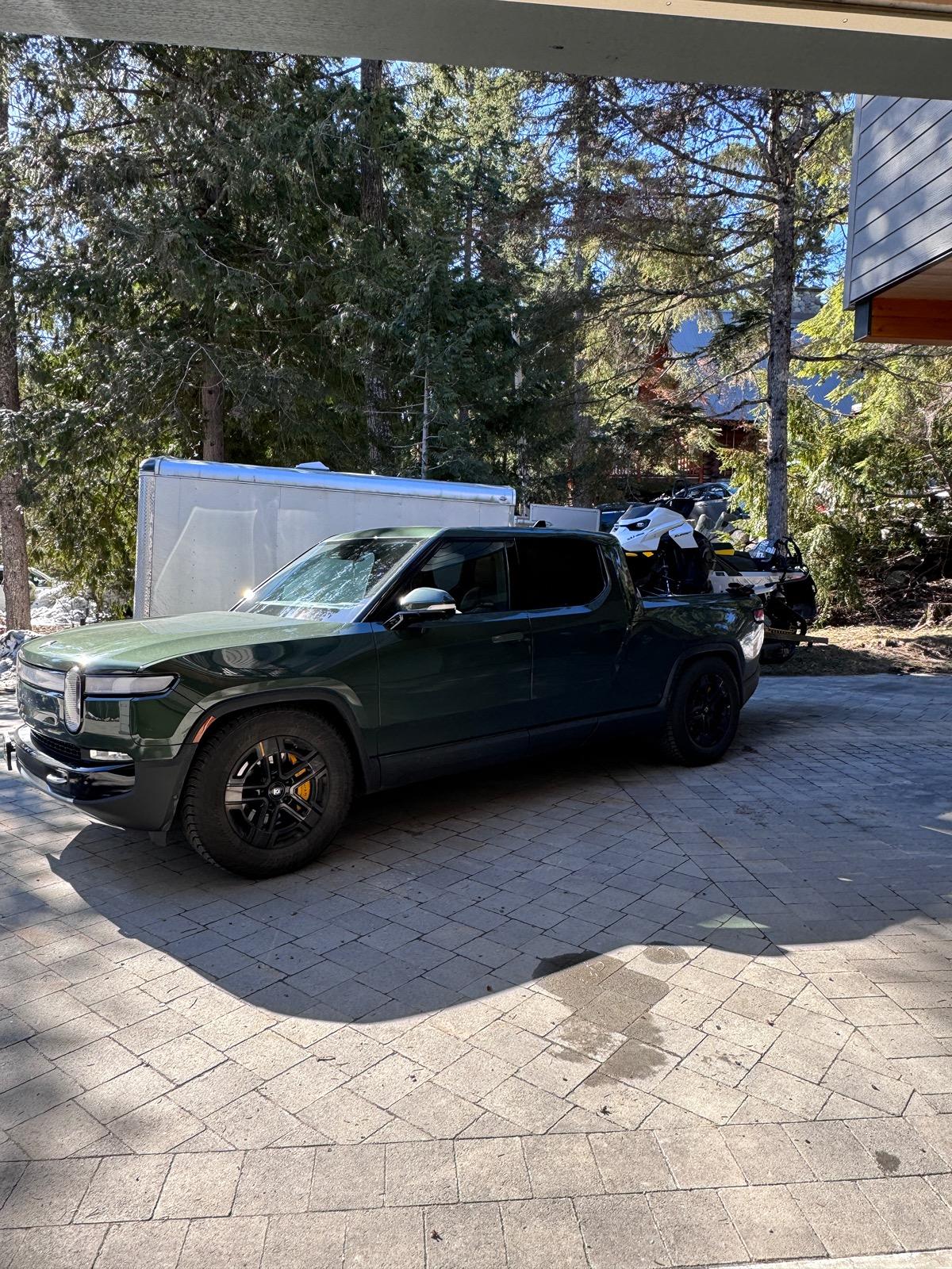 Rivian R1T R1S Snowmobile in R1T bed with deck / bed extender -- fits and performs well IMG_1994